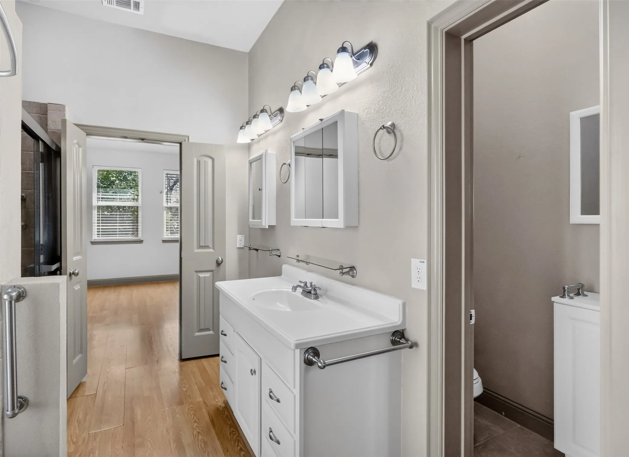 ANOTHER VIEW OF THE PRIMARY BATHROOM VANITY