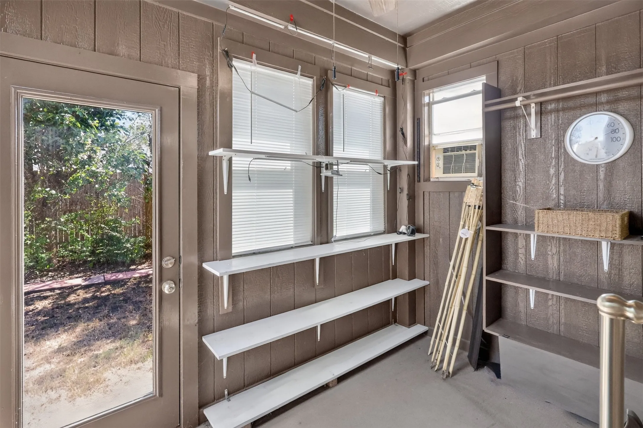 COVERD PATIO-SUNROOM-OFFICE WITH WINDOW AC UNIT