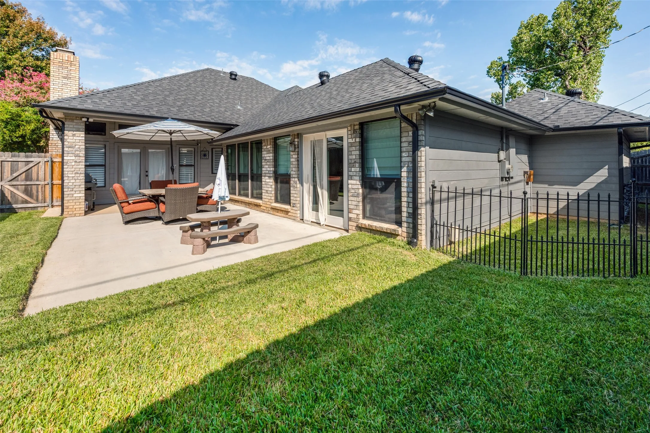 Extended Patio with Access from Living room, Family Room and Primary Bedroom