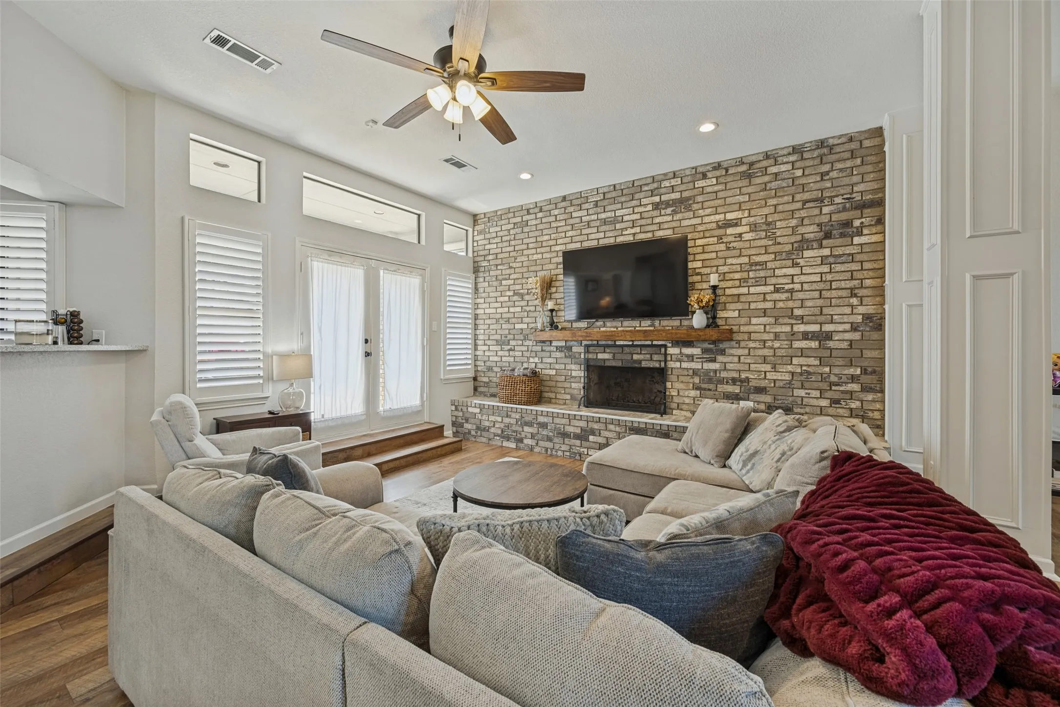 Living Room with Brick Fireplace