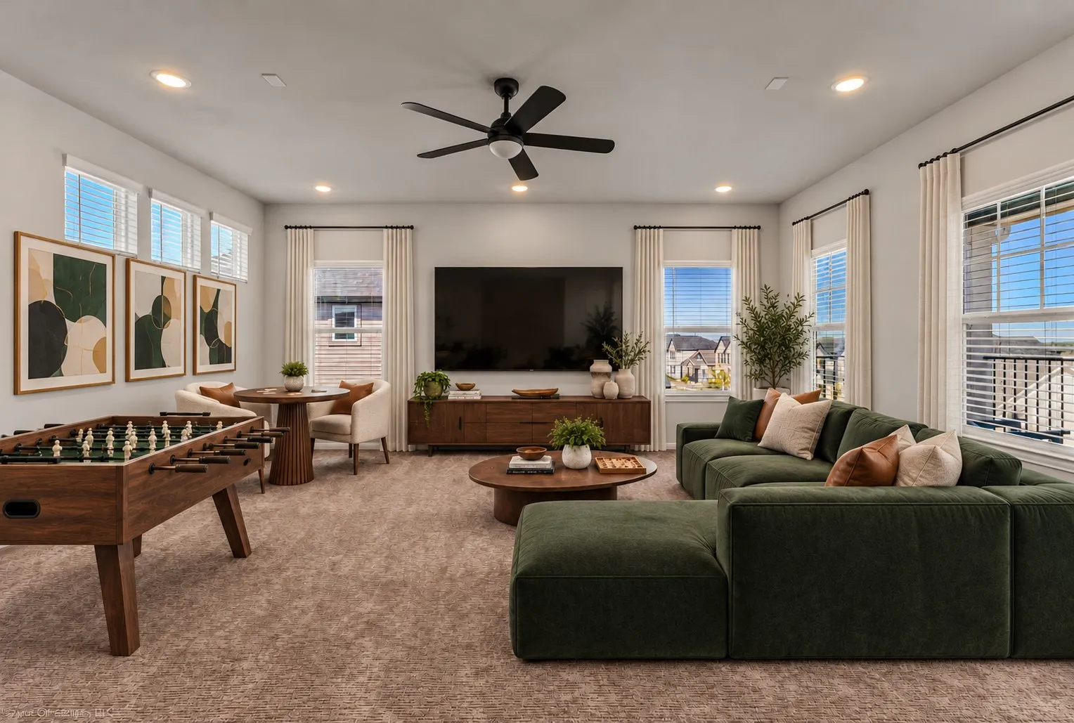 Recessed lighting, ceiling fan, multiple windows with blinds, and carpeted flooring
