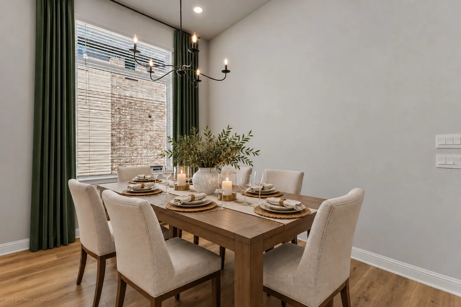Wood-finish flooring, recessed lighting, and a modern chandelier