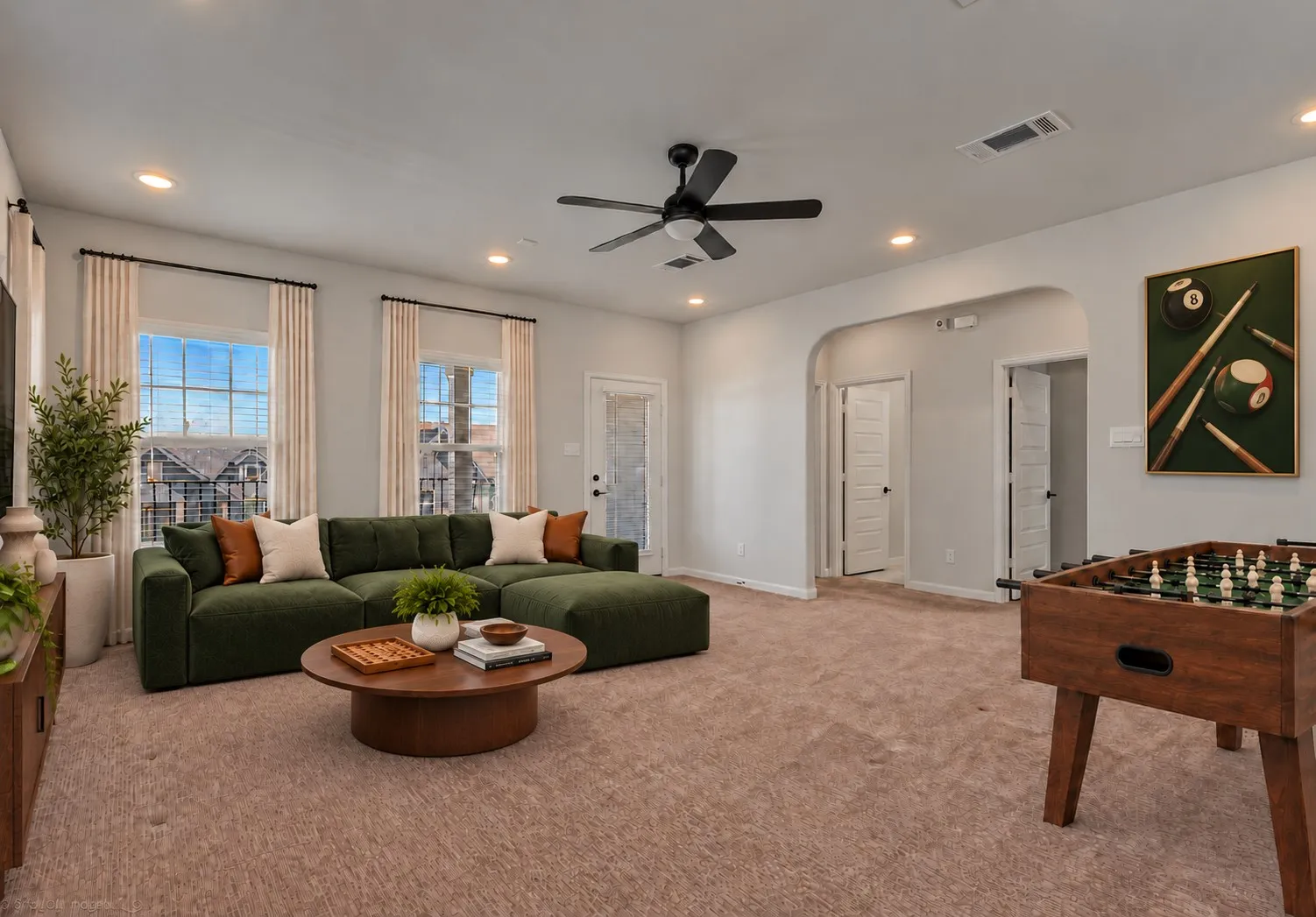 Recessed lighting, ceiling fan, and carpeted flooring