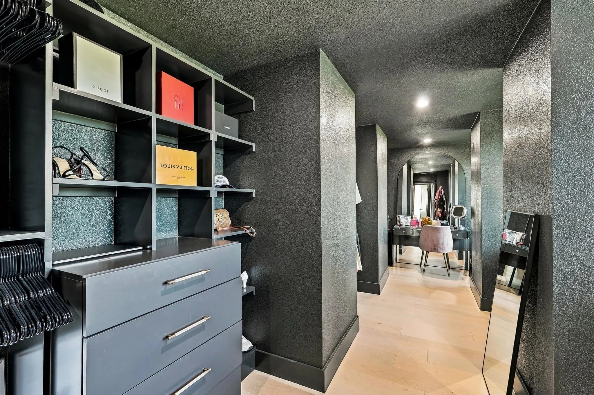 Custom built-in shelving with integrated drawers