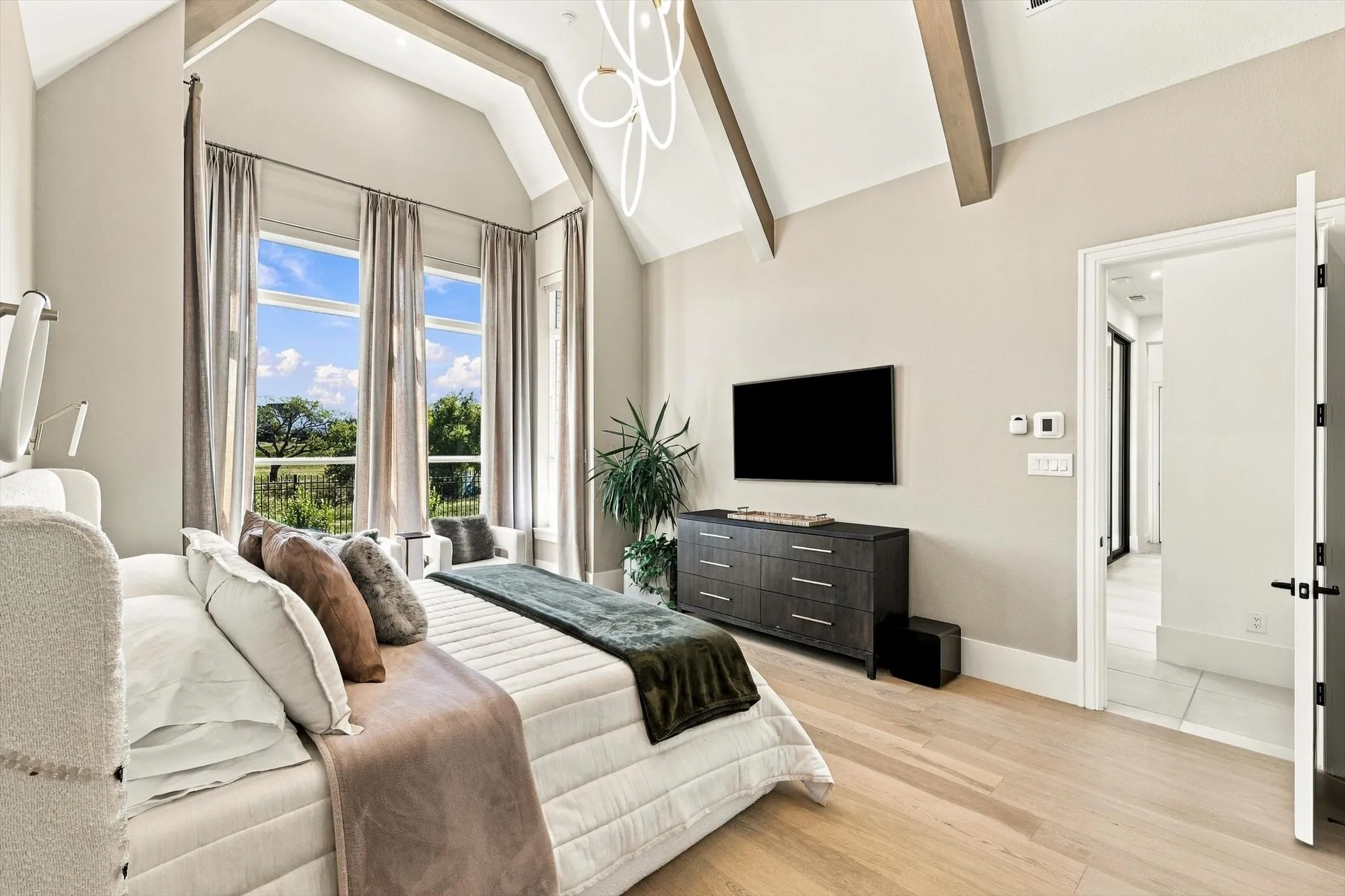 Soaring vaulted ceilings with exposed wood beams