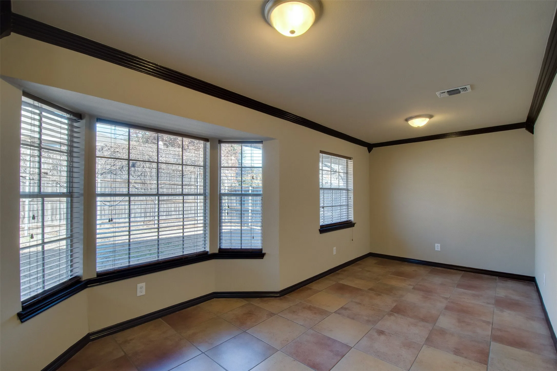 Spacious dining room; divide it and use as office space in the back