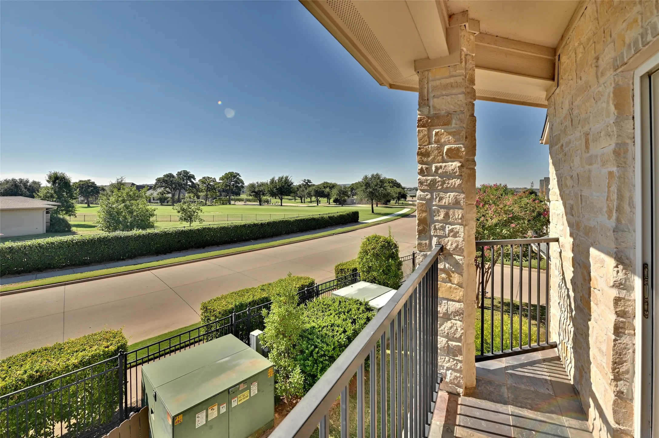 Overlooking golf course.