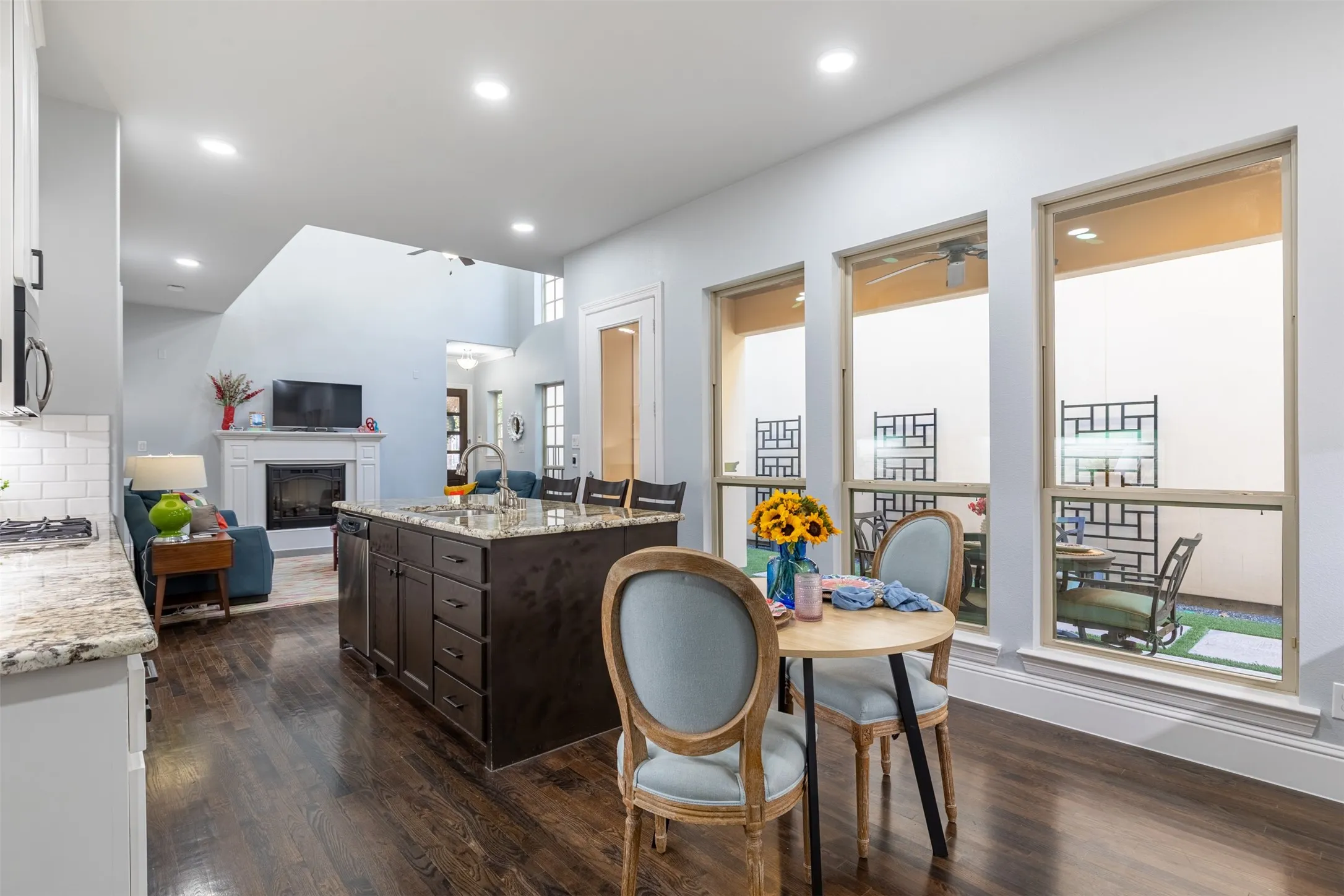 Breakfast area flows nicely to kitchen and living area.