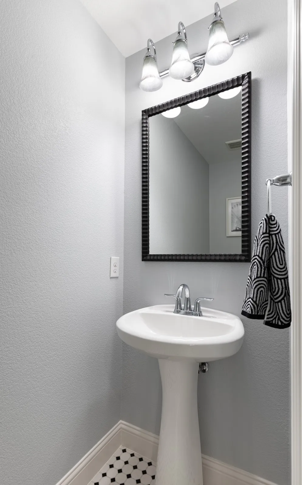Half bath off game room.