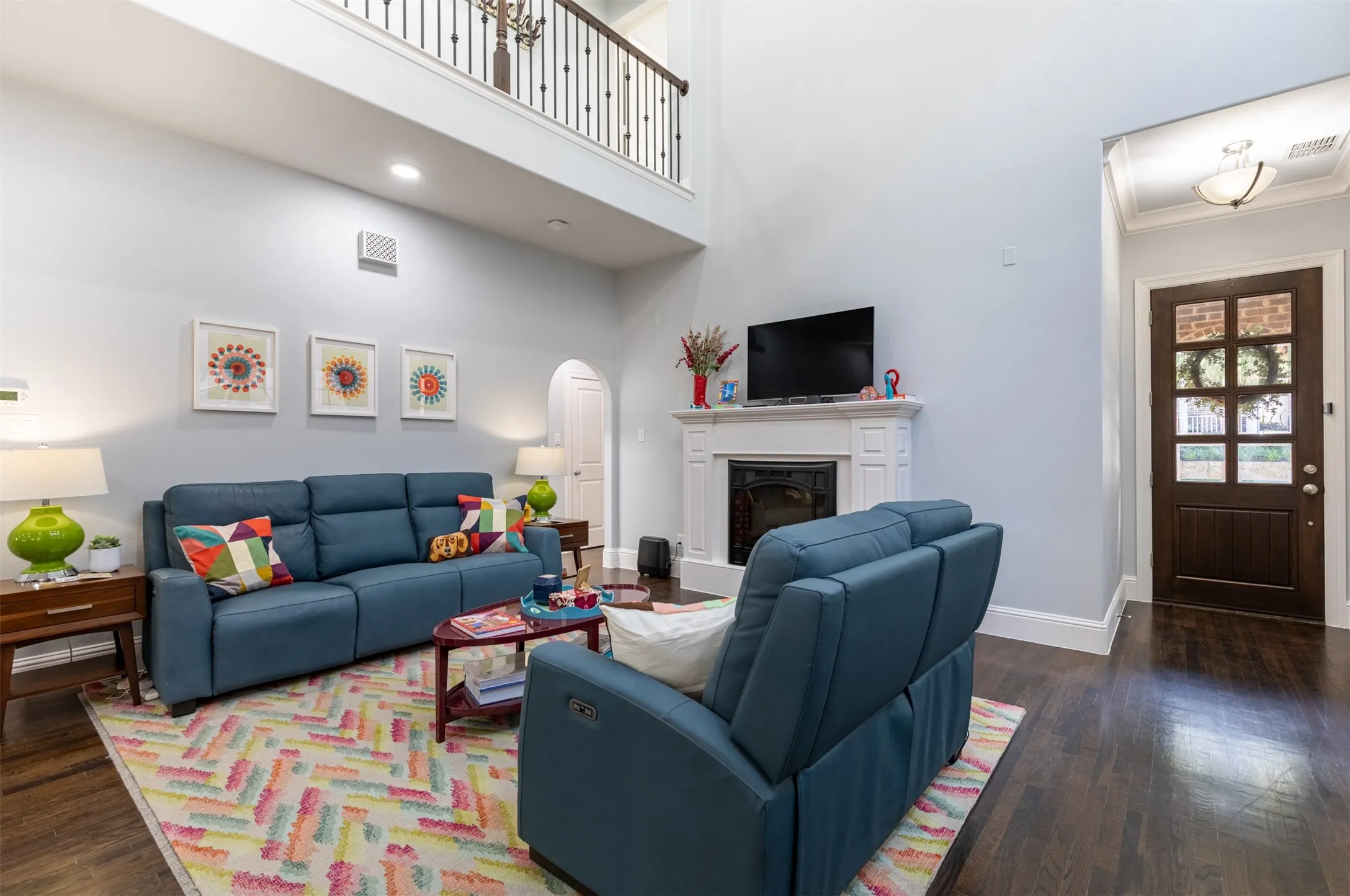 Living room anchored by a cozy fireplace.