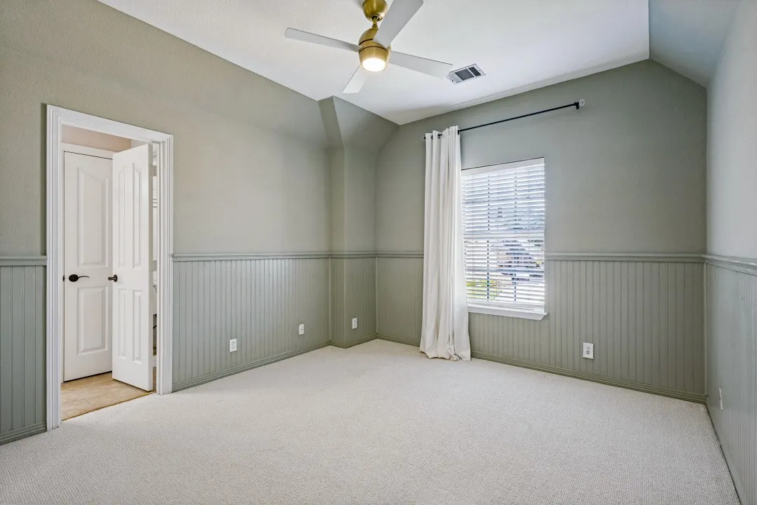 UPSTAIRS BEDROOM SITS ON THE FRONT OF THE HOME