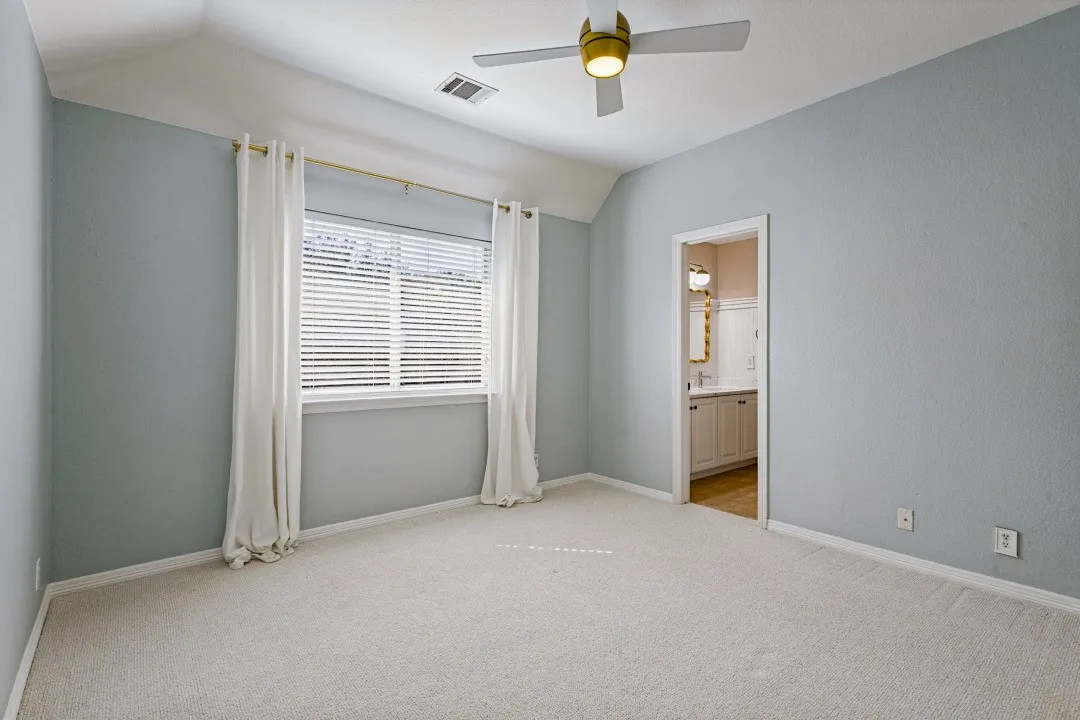 UPSTAIRS BEDROOM SITS ON THE BACK OF THE HOME