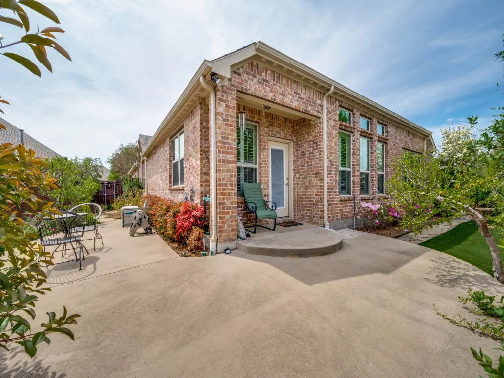 Extended rear and side patios create exceptional low-maintenance outdoor living space