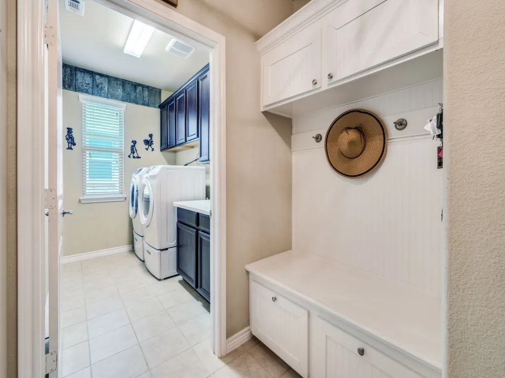 Laundry room with adjacent mud bench for added function and convenience