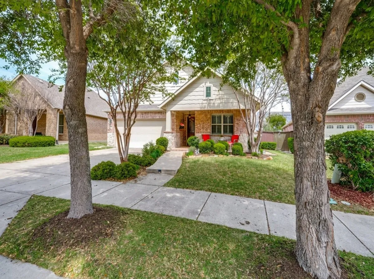 Classic curb appeal and a front porch made for connecting with neighbors