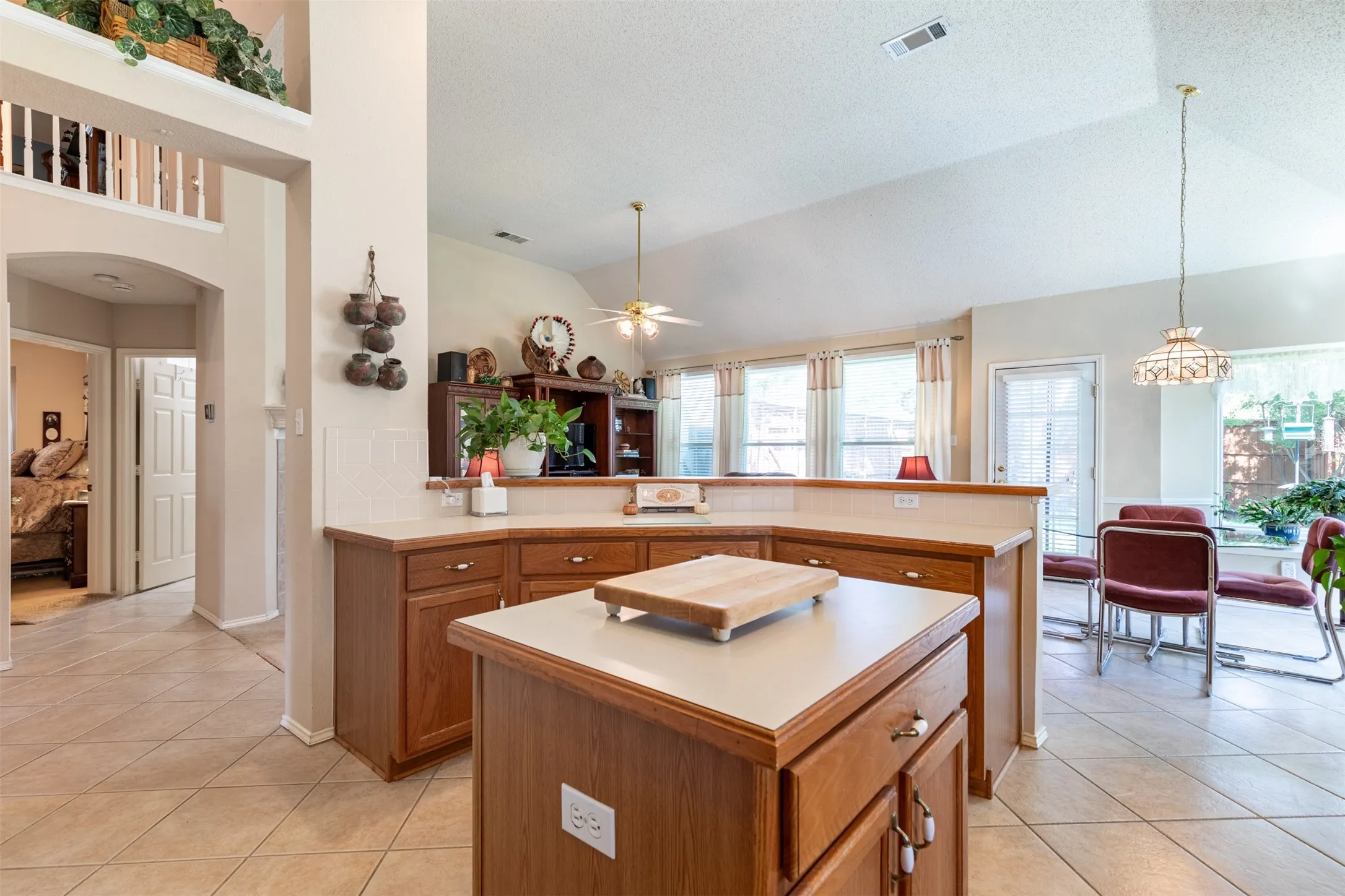 Kitchen features wrap around breakfast bar.