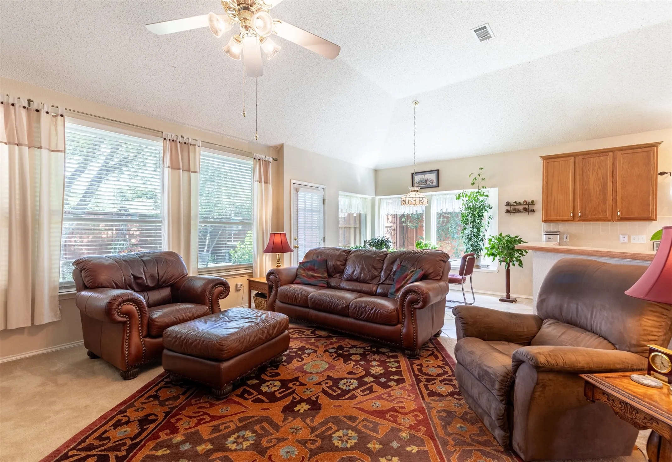 Spacious living room filled with natural light.