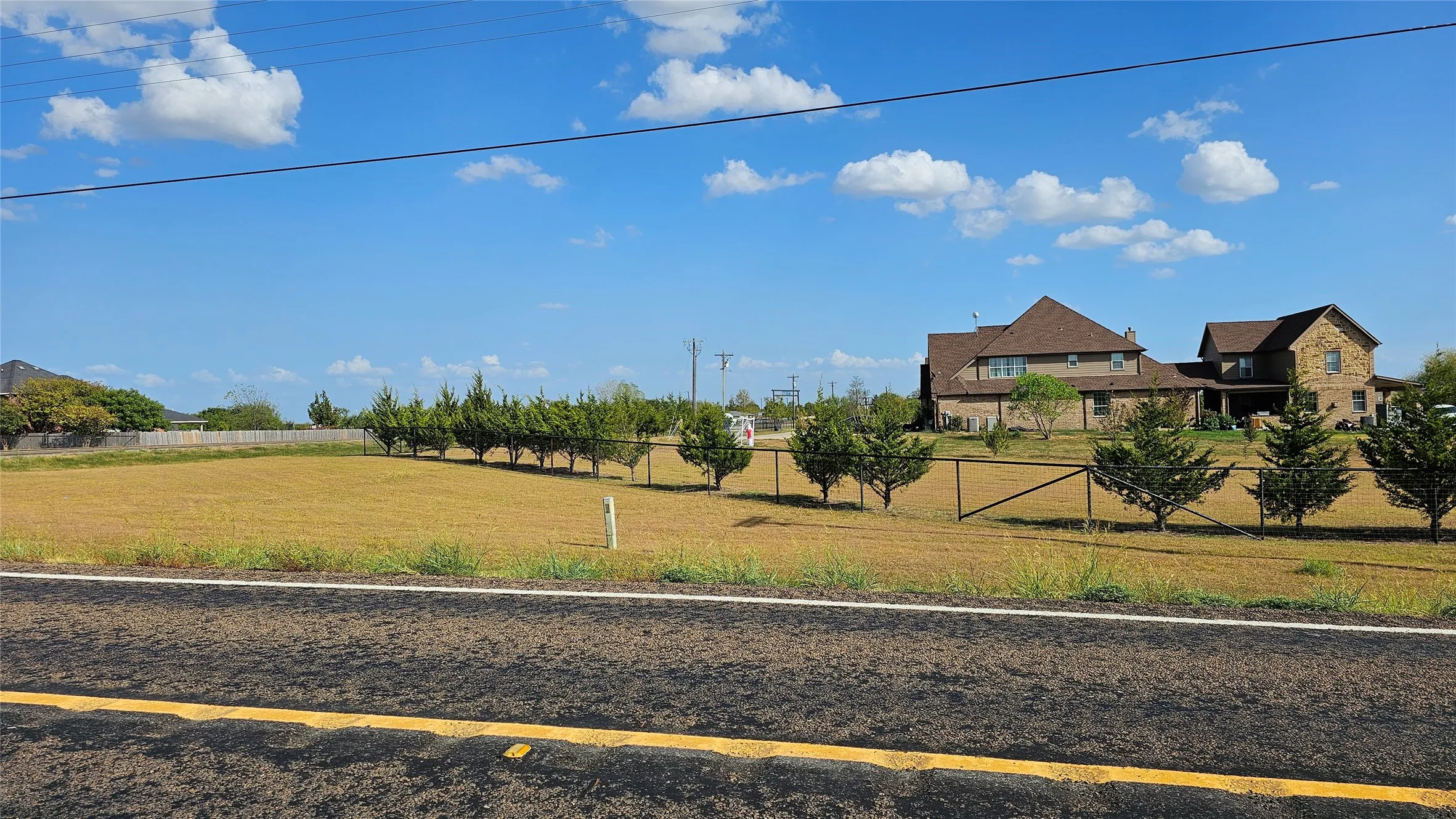 View from the road showing neighborhood to the northeast side.