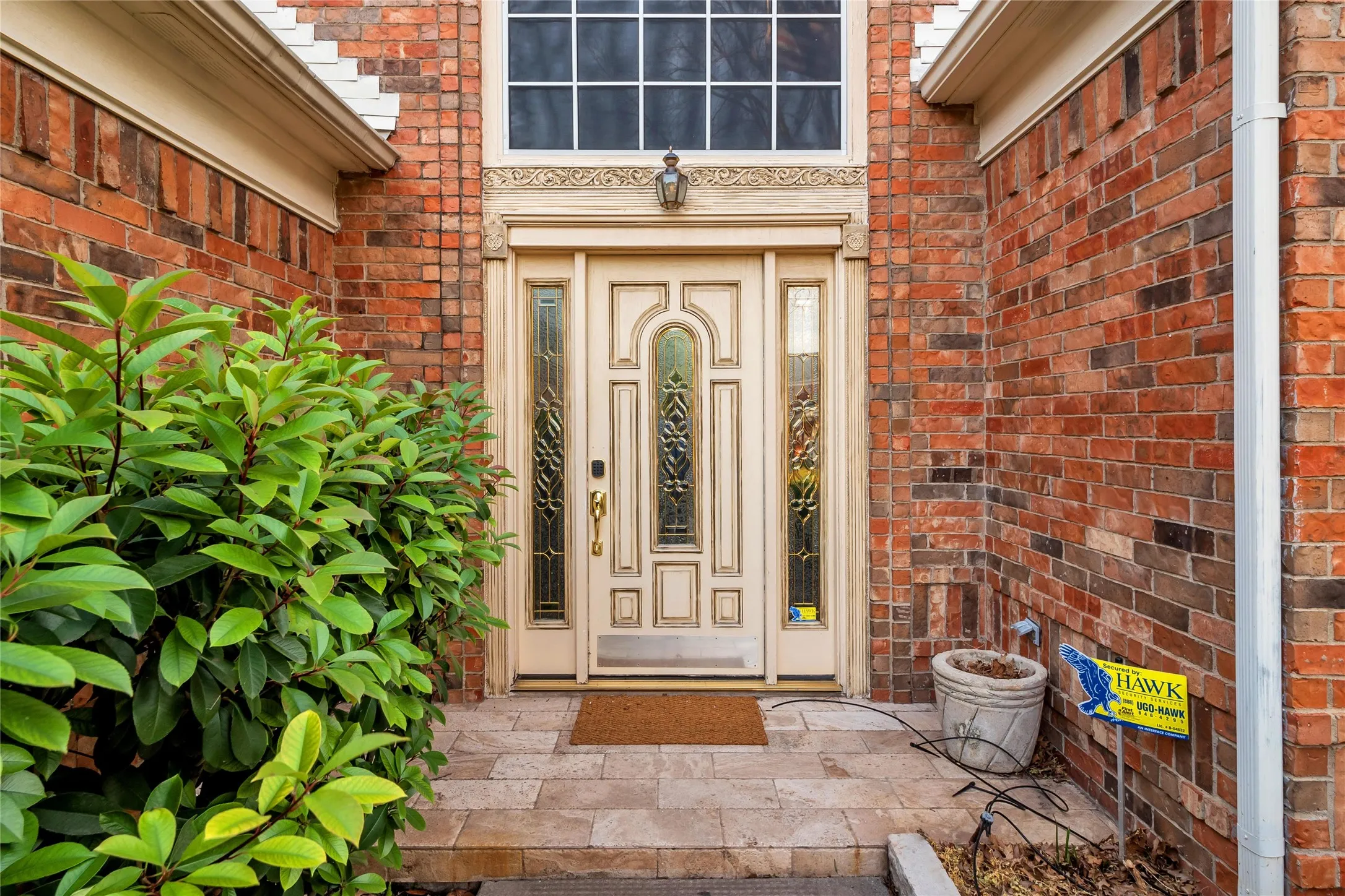 Brick facade with decorative stone accents