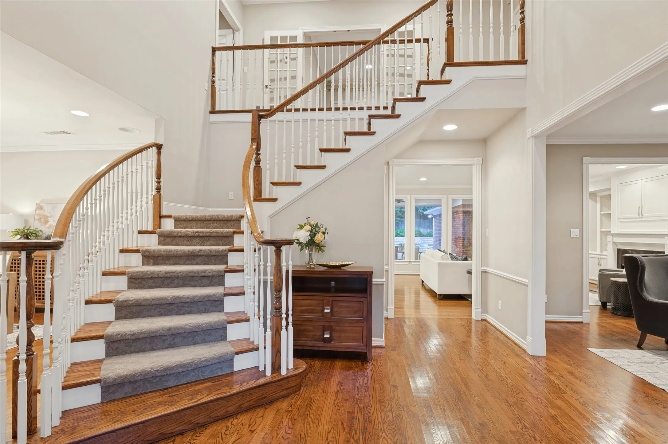 Staircase with upstairs views