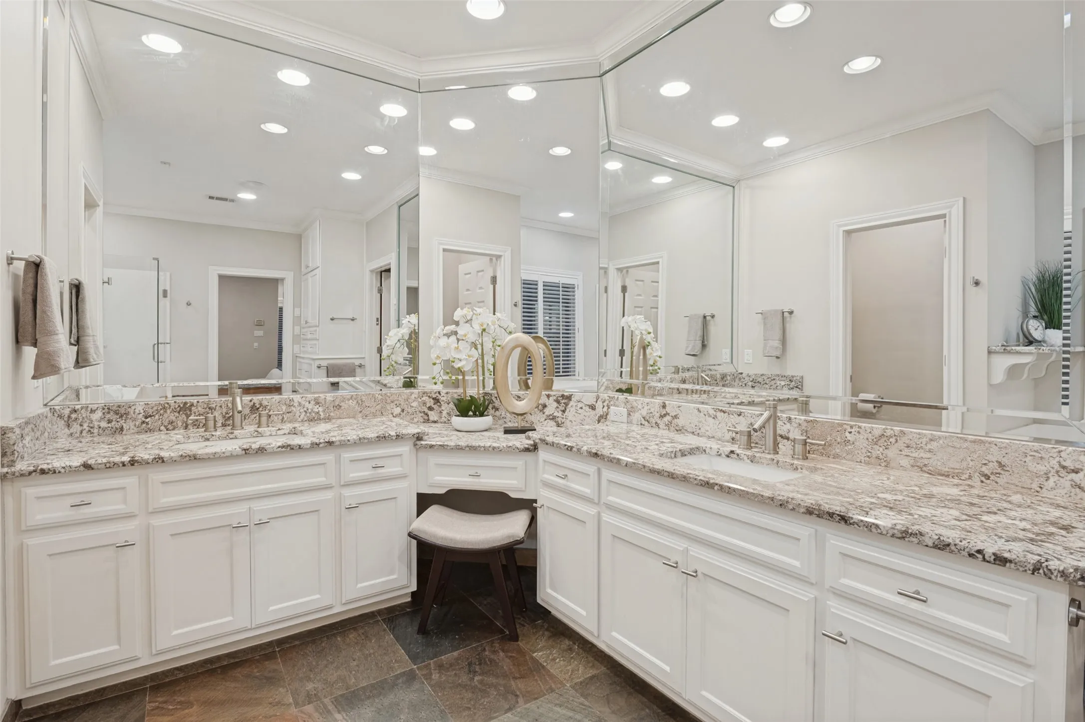 Double vanities with granite countertops