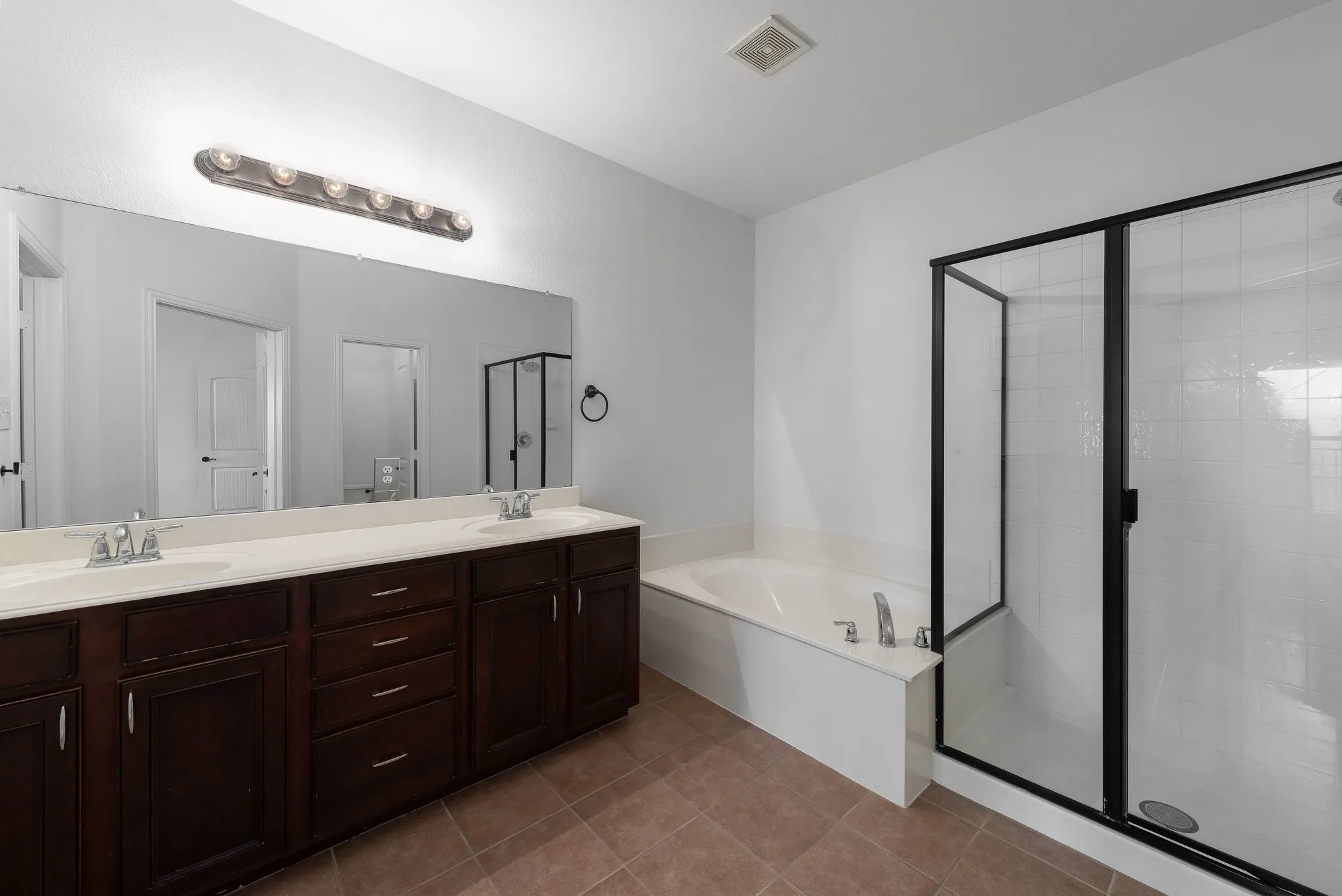 Primary ensuite with dual sinks.