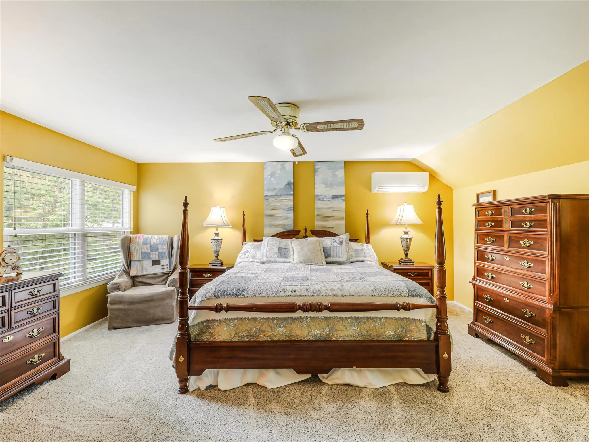 Primary bedroom on second level with special and cozy areas to relax in with views of your backyard!
