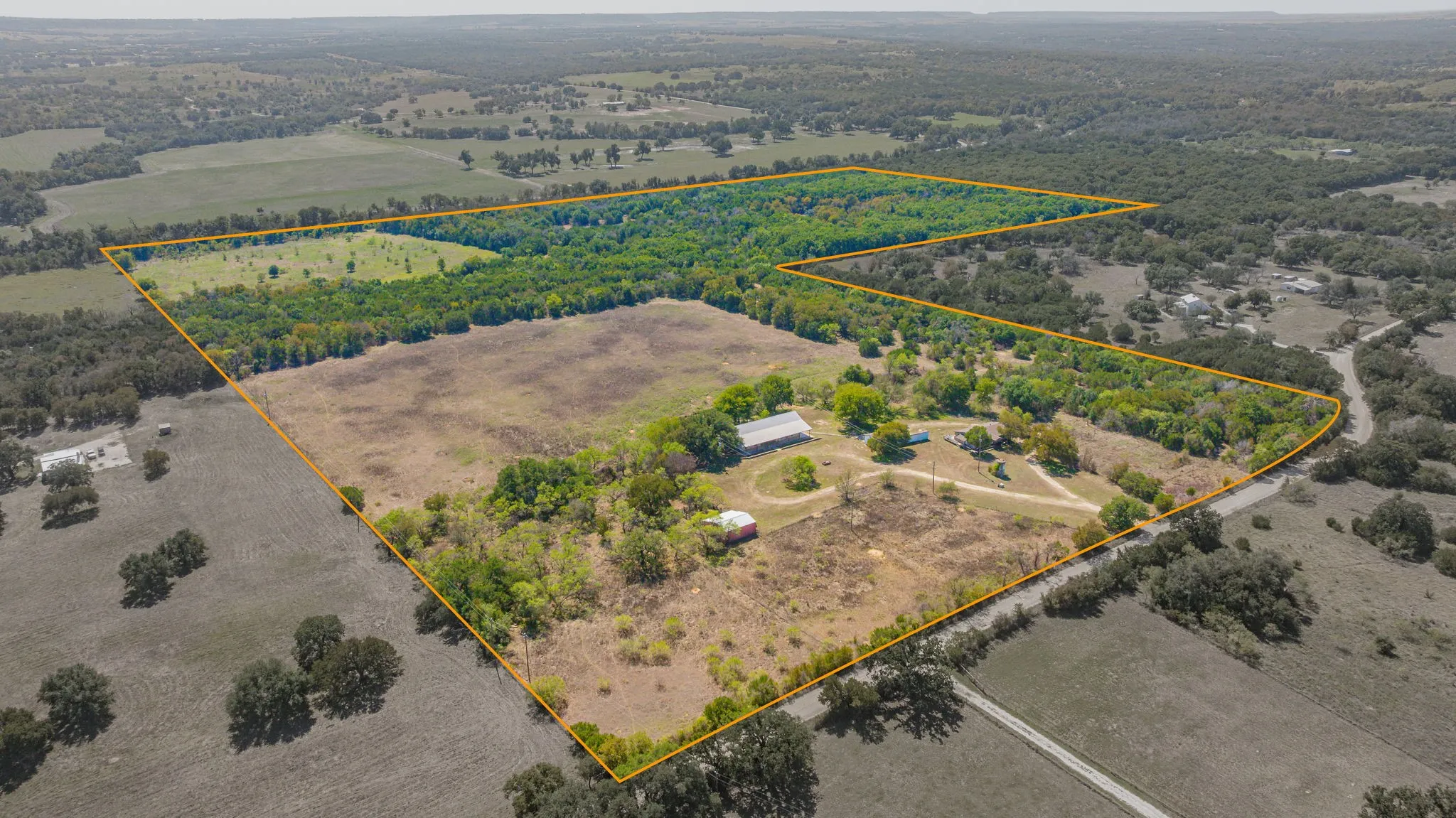 Aerial- Home and Improvements, County Road Angle