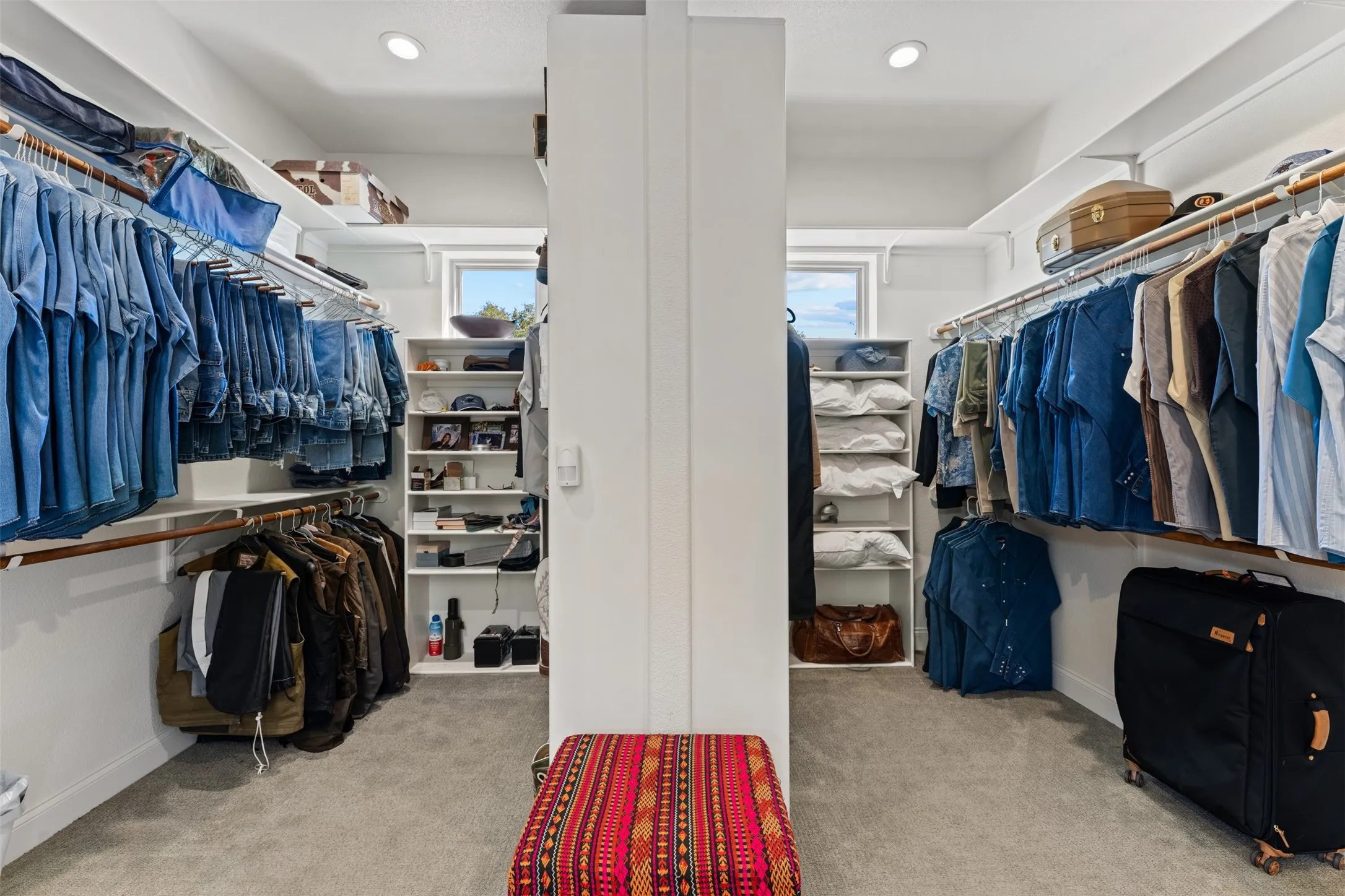 An expansive walk-in-closet, located off the primary ensuite bathroom, offers generous wardrobe storage and the feel of a private dressing room.