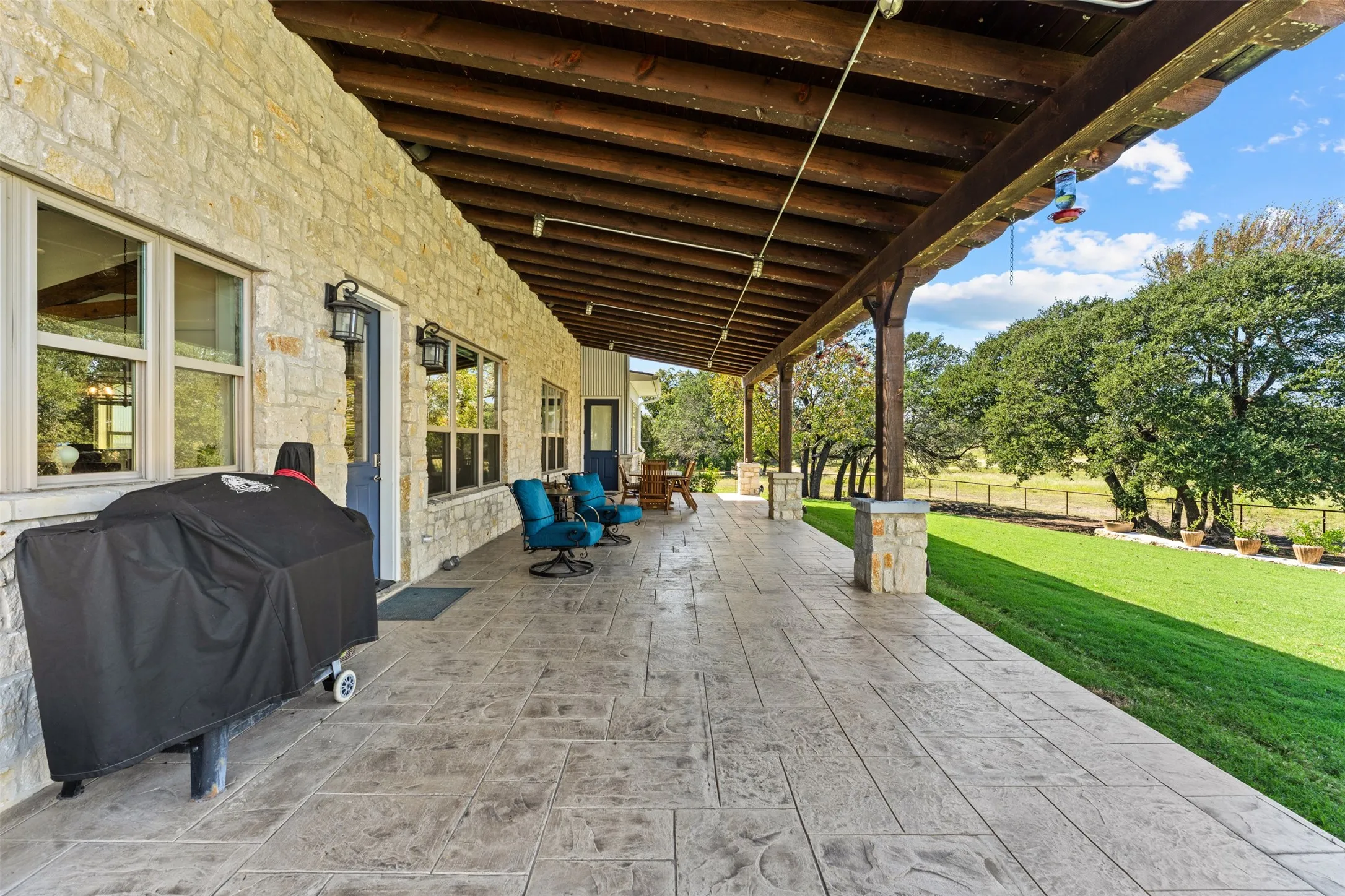 The expansive porch is the perfect place to relax or entertain family and friends.