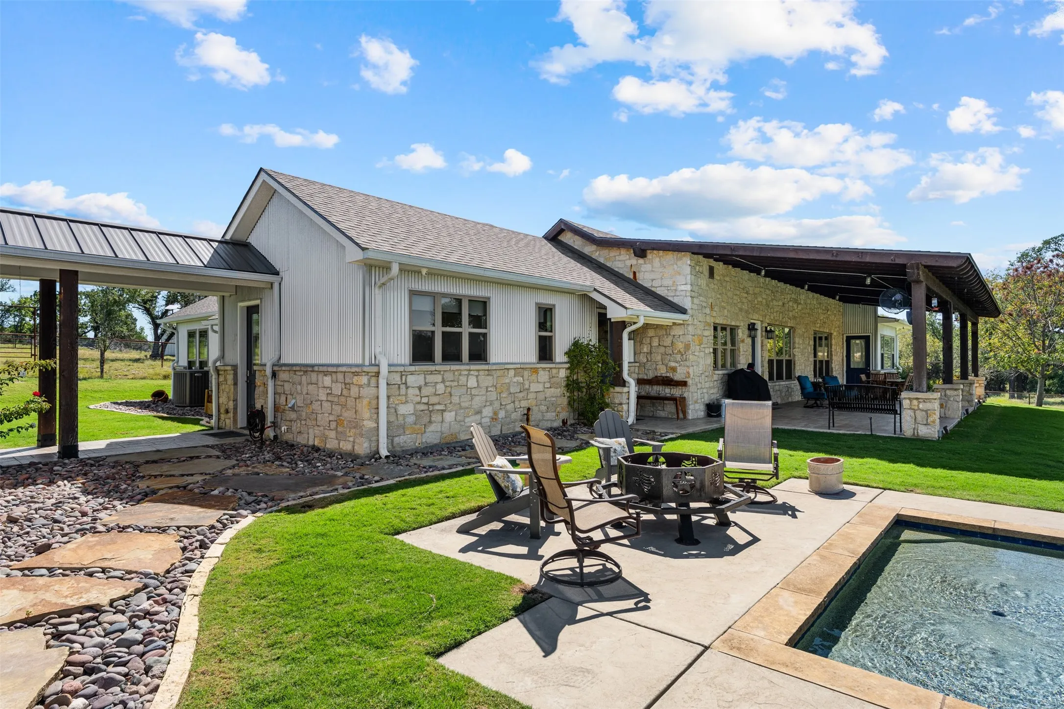 The main home has a detached garage connected by a covered breezeway.