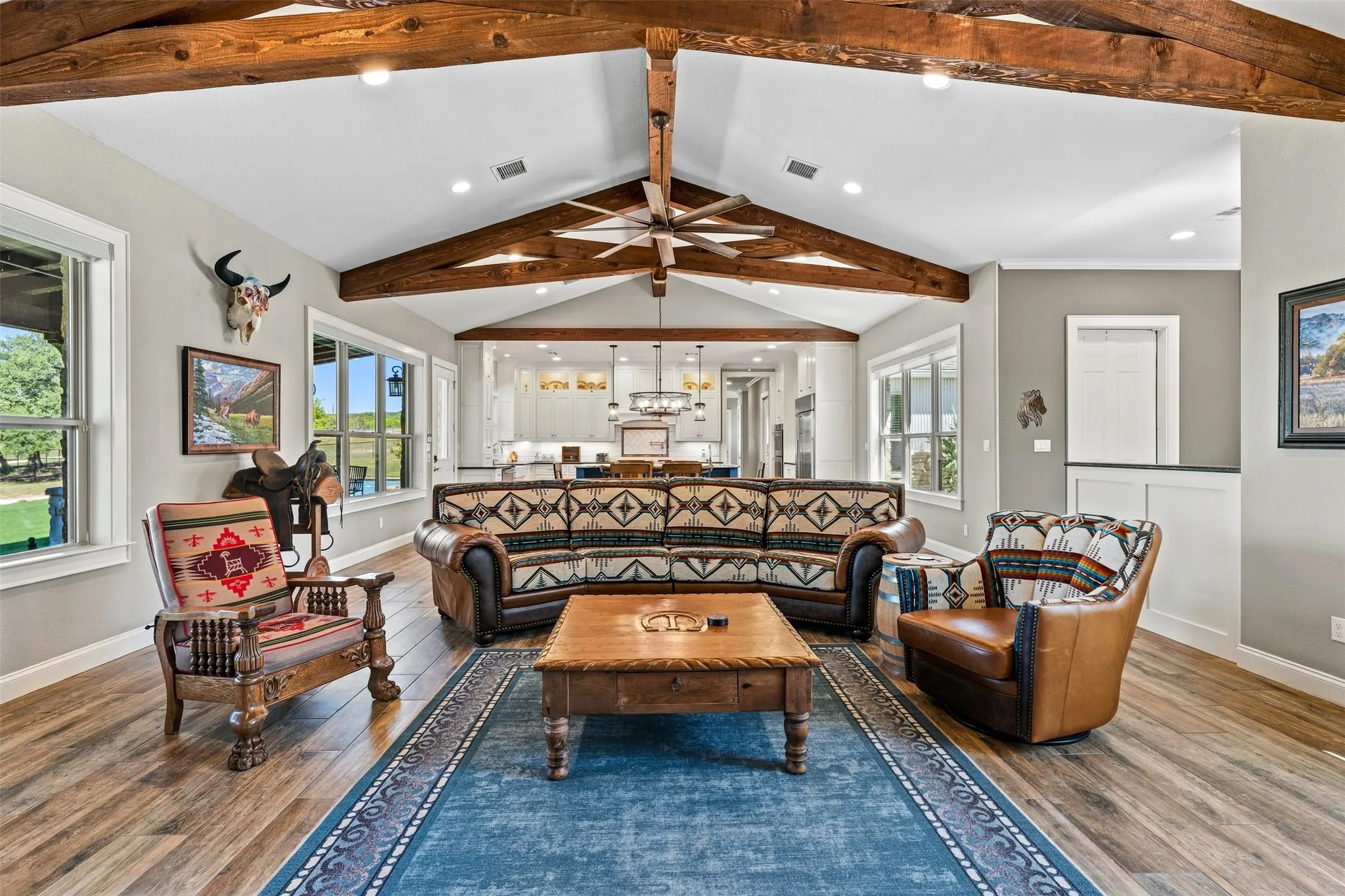 A dedicated workspace is thoughtfully positioned just off the living area.