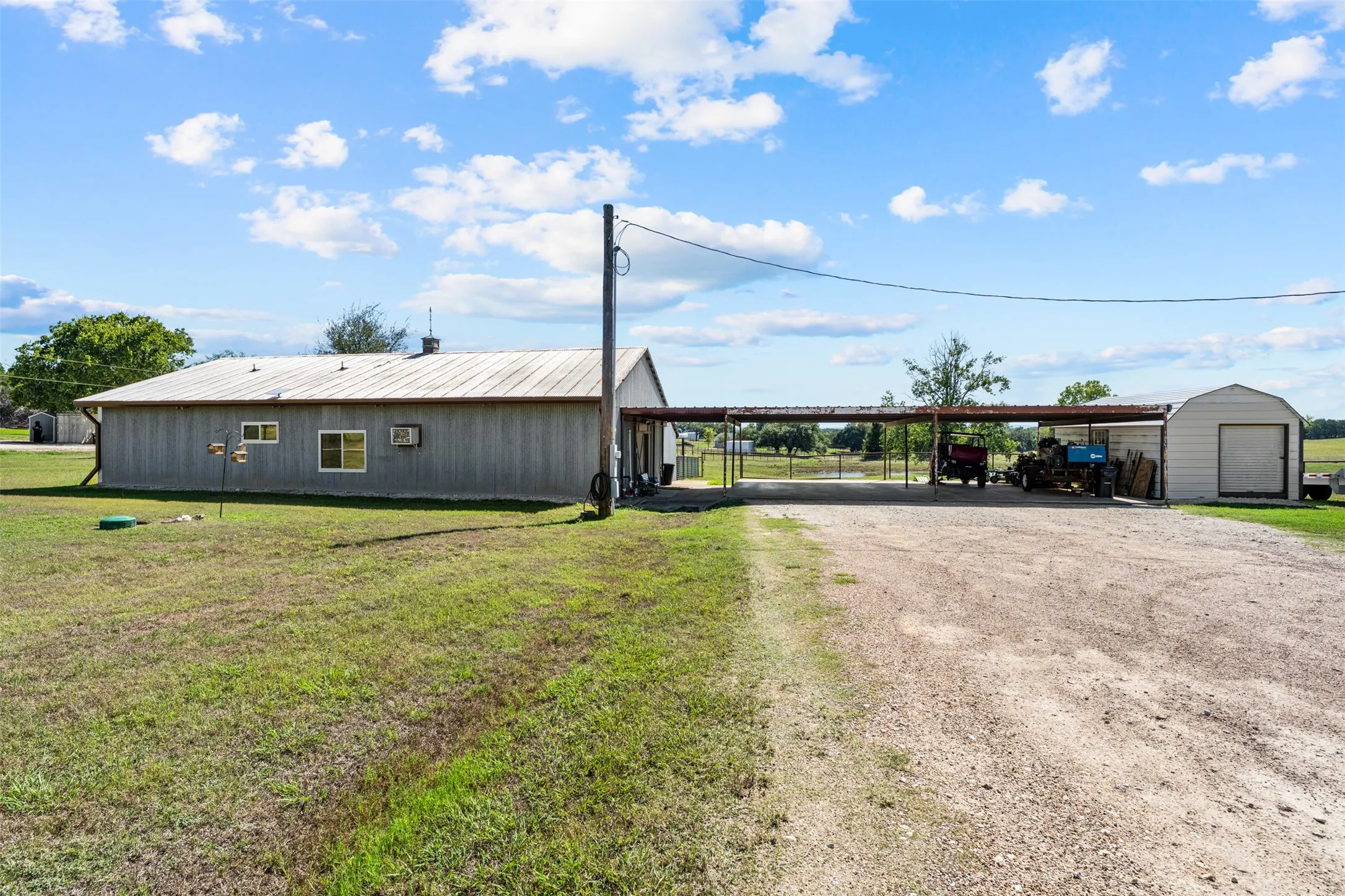 The three bedroom, one bath guest house has a large carport for convenient parking.