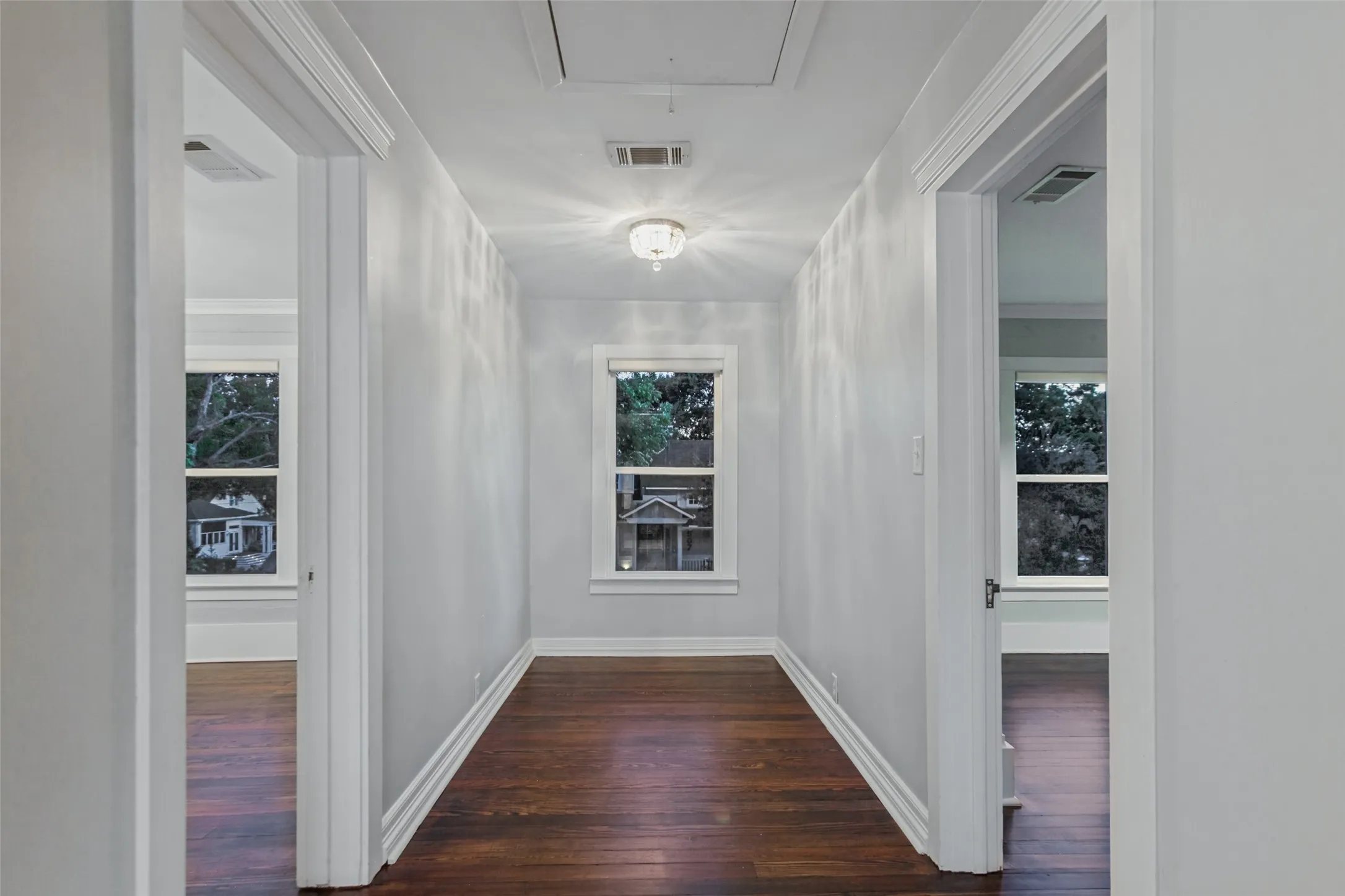 Hallway upstairs leading to two bedrooms