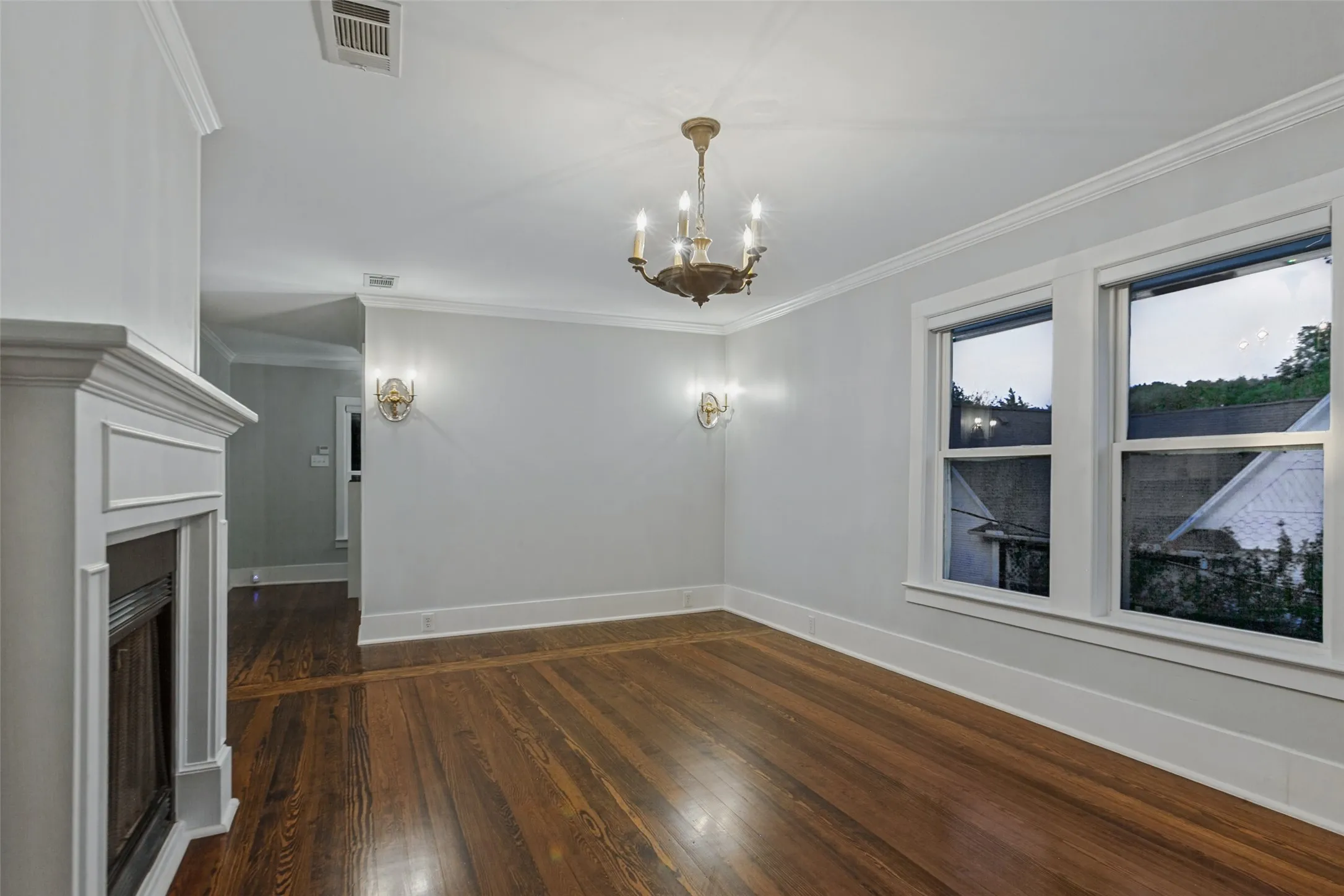 Primary Suite with views of the garden and fireplace