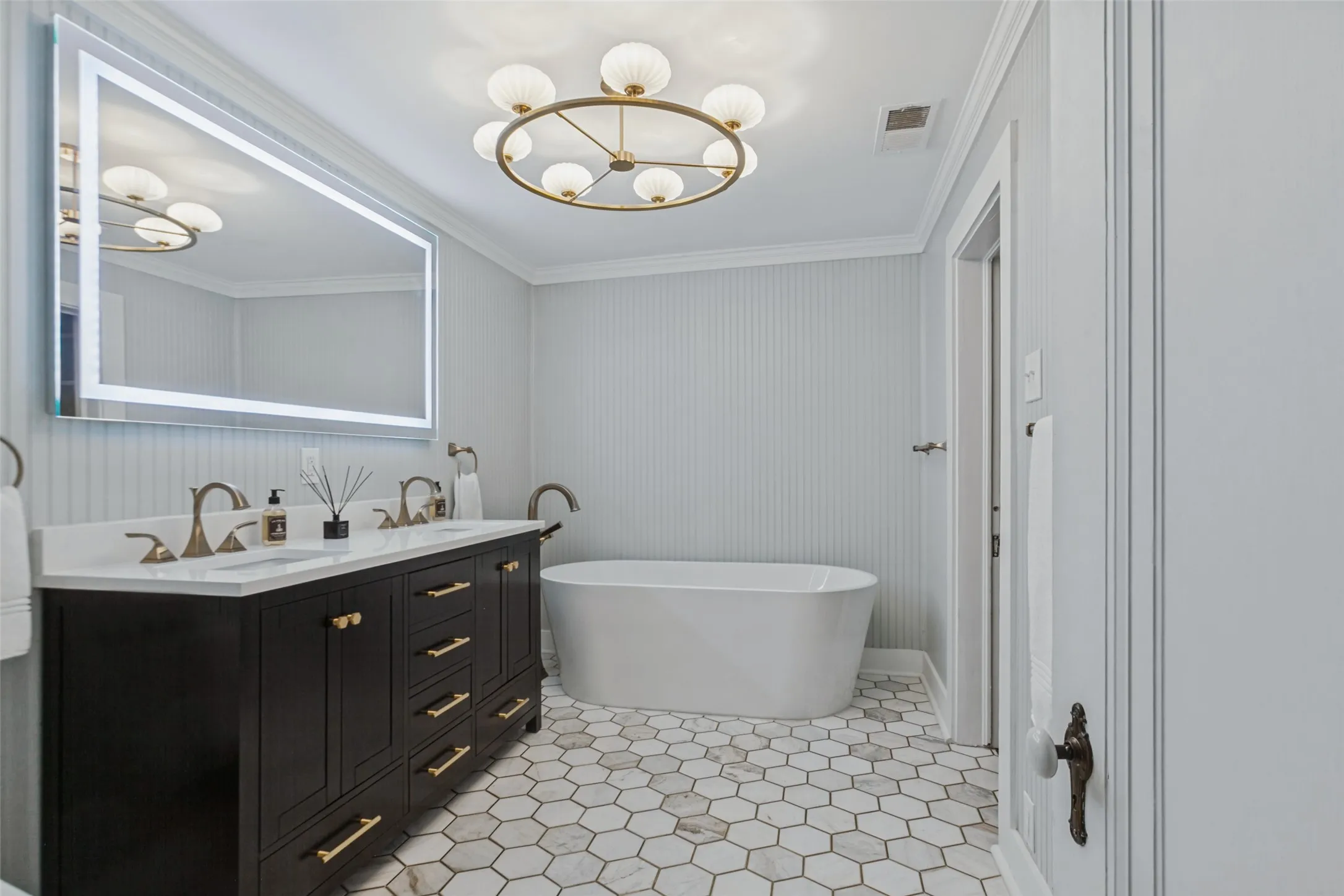 Full bathroom upstairs with duel sink and bidet