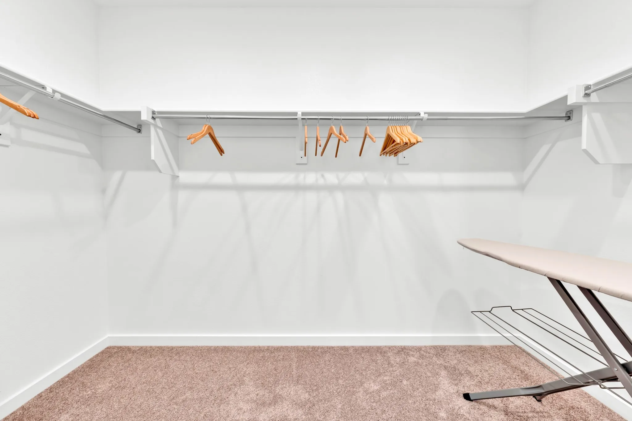Built-in shelving with hanging rods