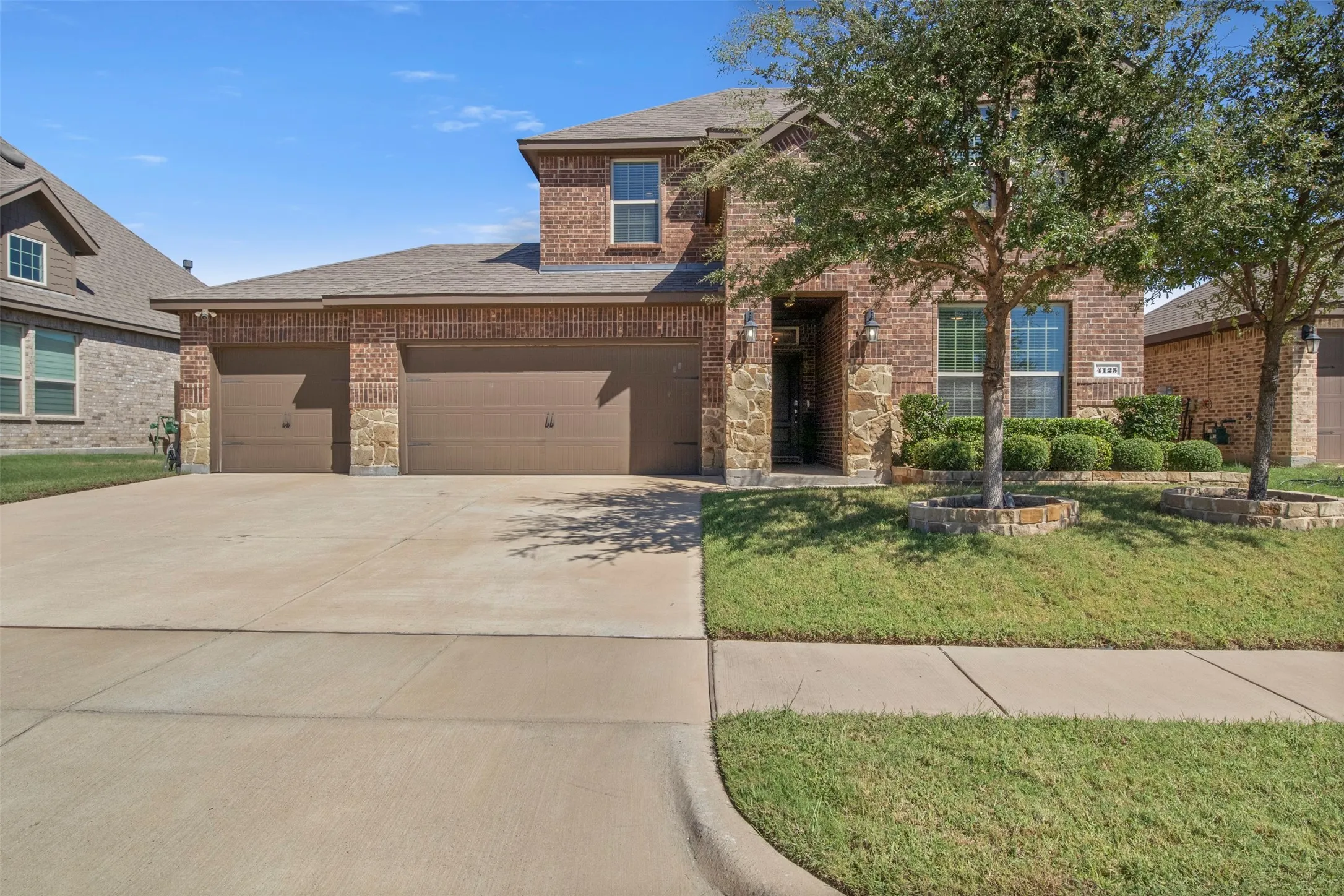 Brick and stone exterior with a two-story design