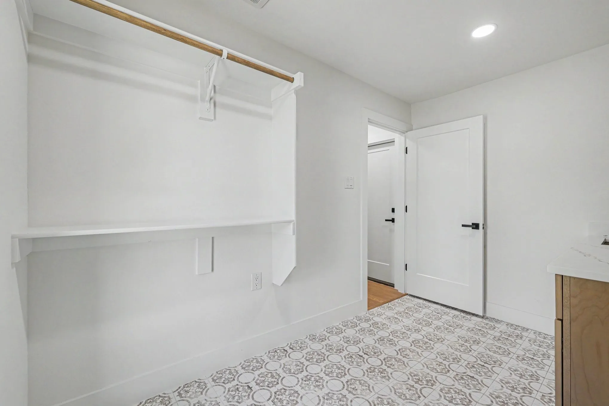 Built-in closet shelving and hanging rod