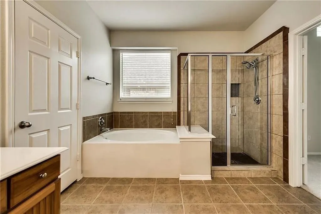 Tiled flooring complementing the neutral wall tones