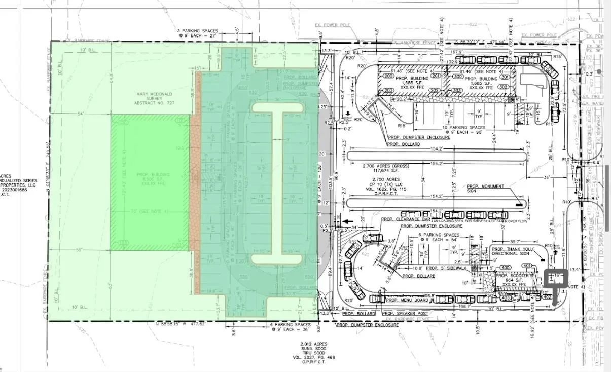 Site Plan. Illustrating the property layout, including designated building areas and parking facilities