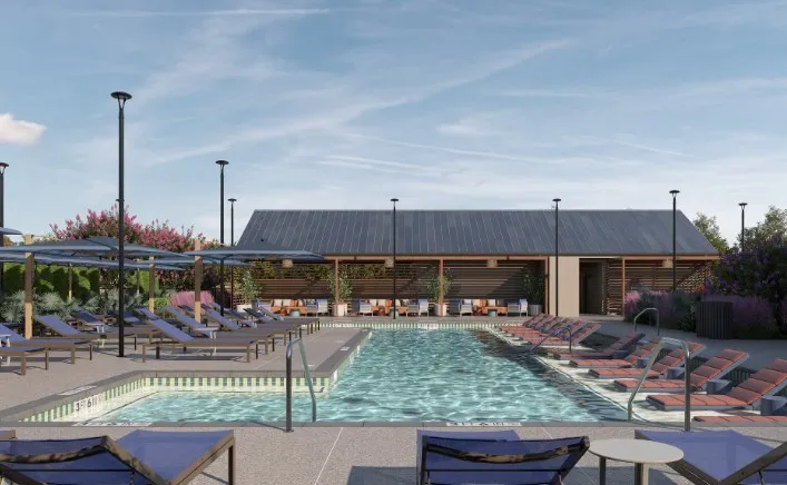 Community pool featuring a patio area