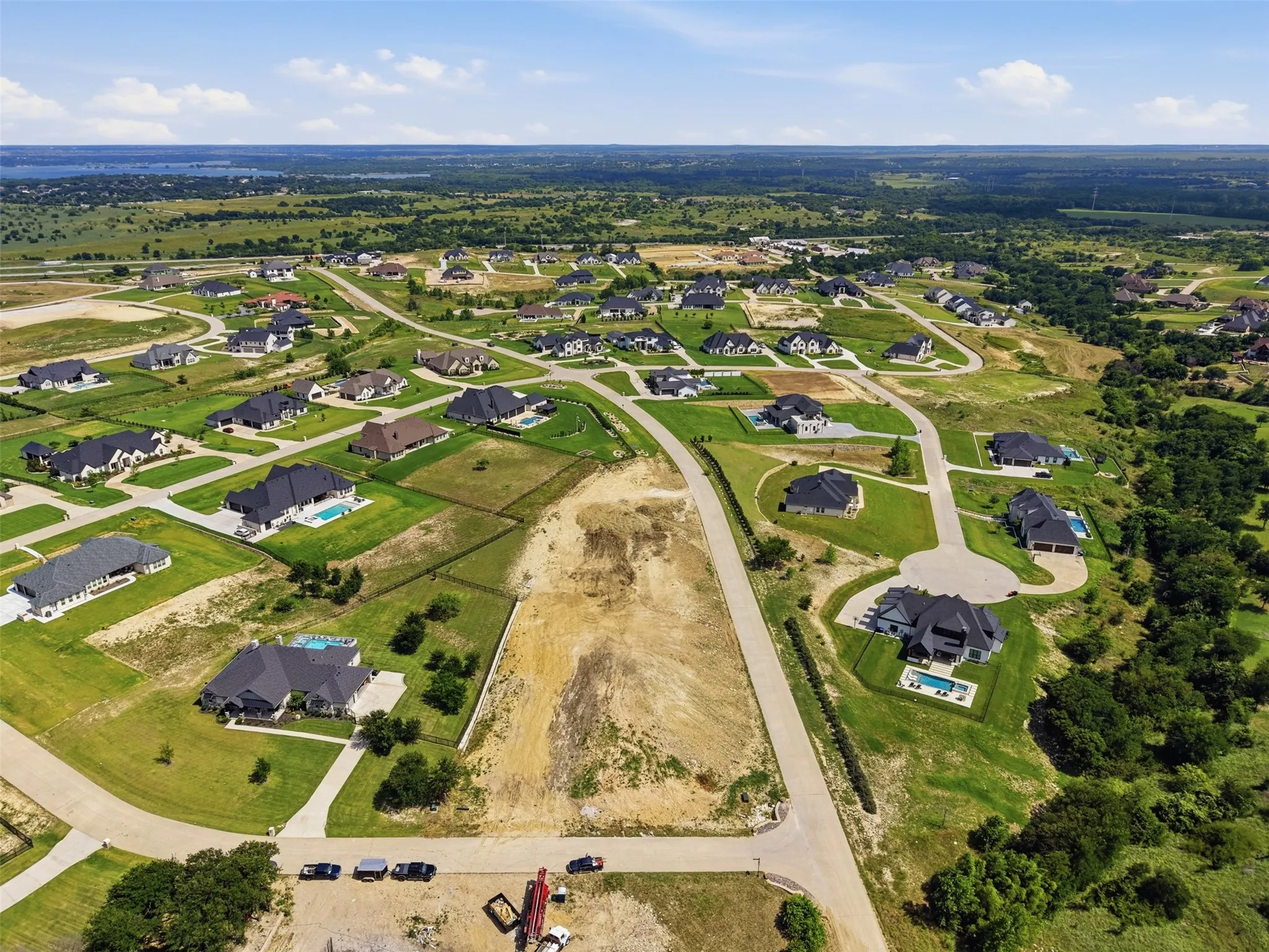 Expansive residential development featuring paved roads and established homes