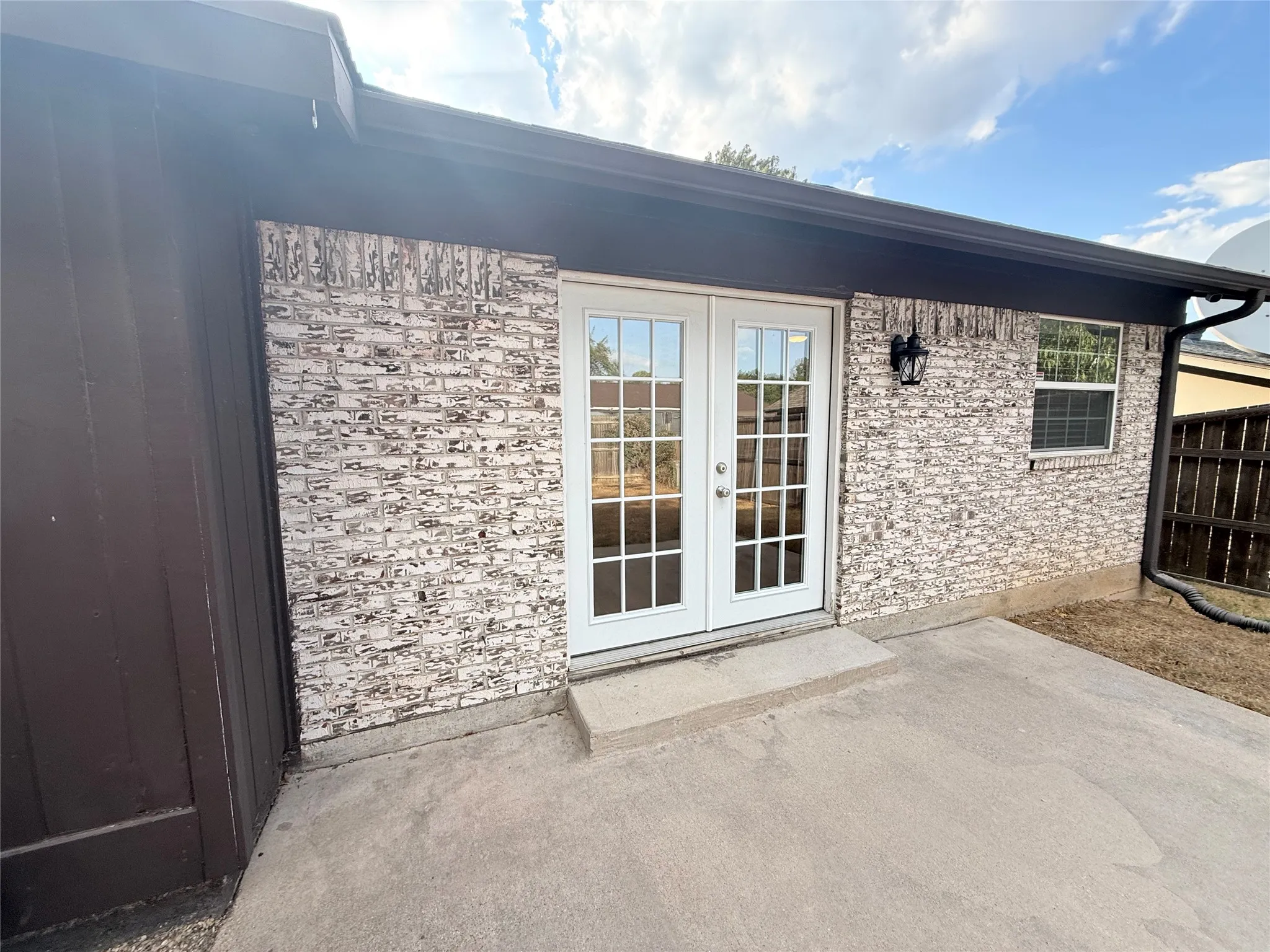 Double doors to back patio.