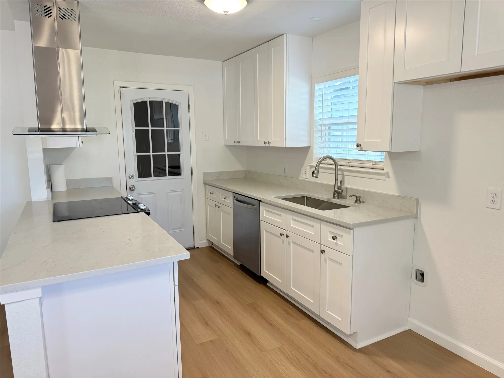 Recently painted. Quartz counter top.