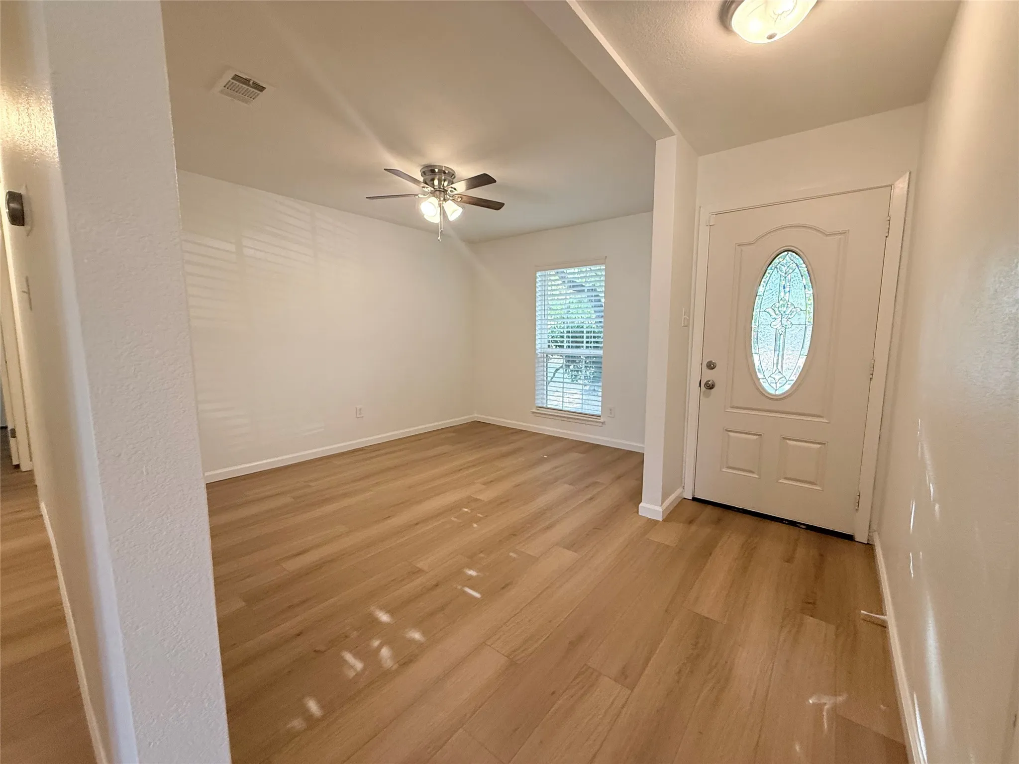 Front room easily used a second living, playroom or office.