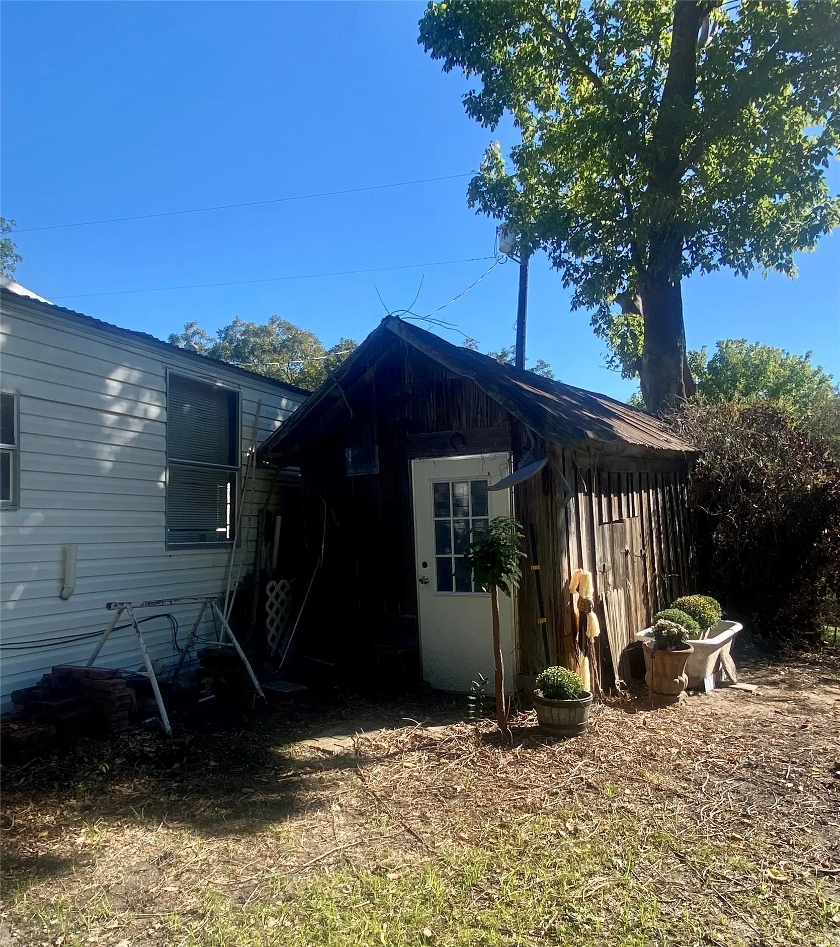 Storage building by garage/workshop entrance