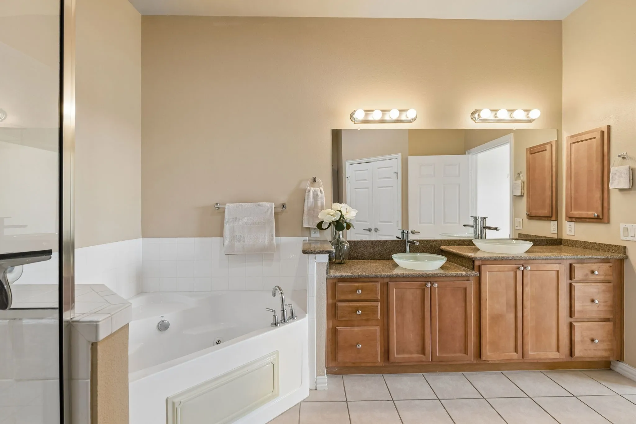 Your own relaxing retreat! Enjoy a soaking tub, separate shower, and dual sinks.