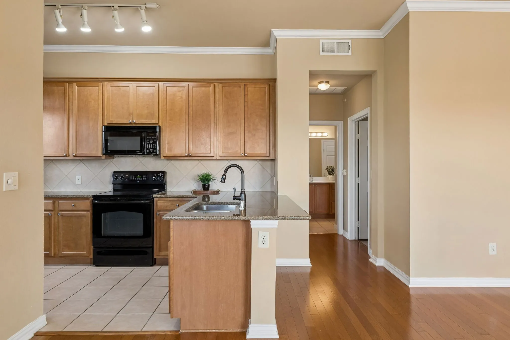 Cook, gather, and connect! The open kitchen keeps you part of the conversation.