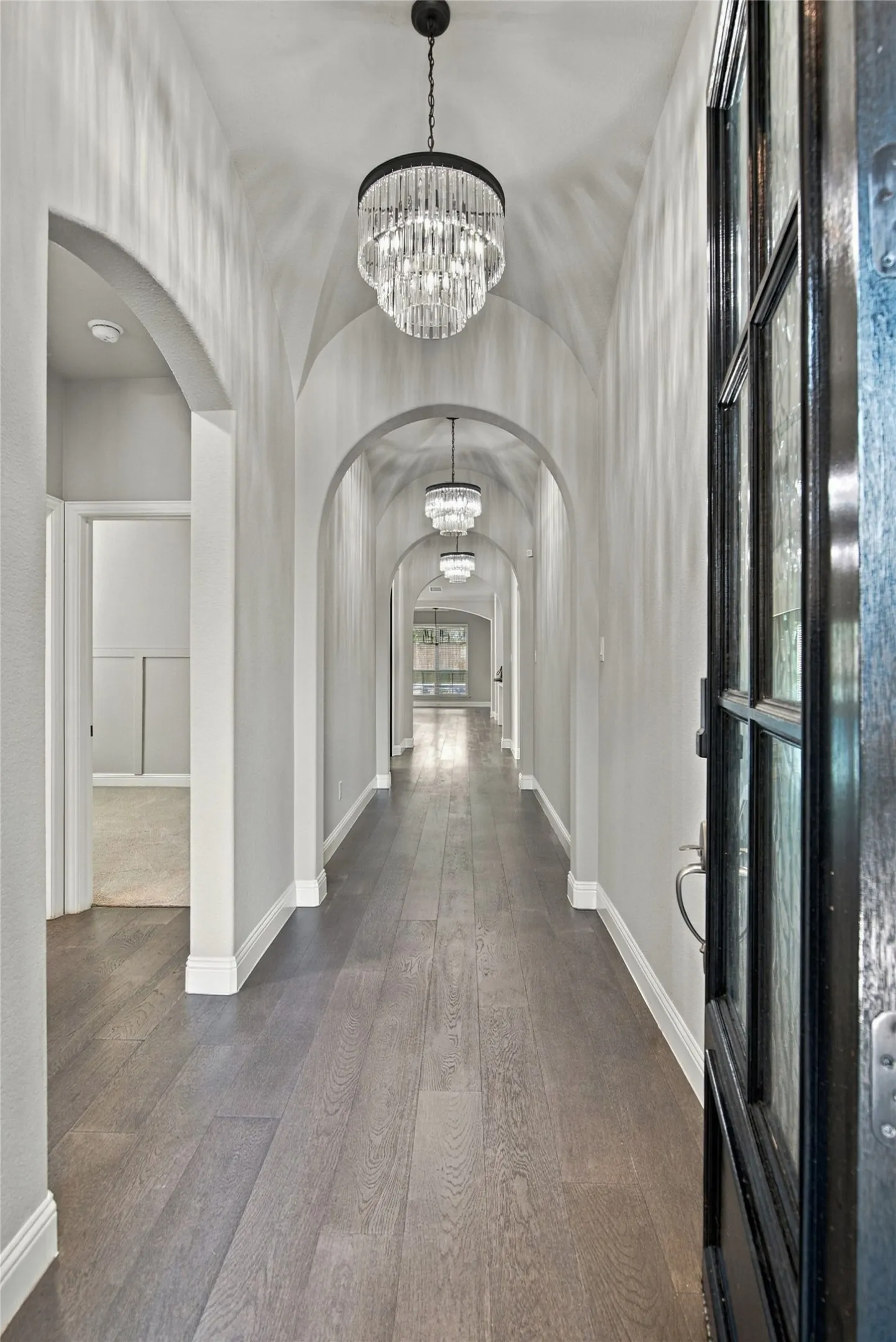 Elegant entry featuring 3 groin ceiling treatments